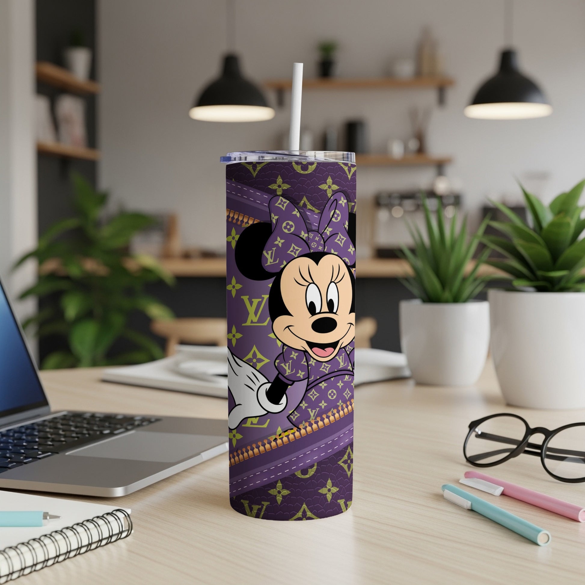 Minnie Mouse on a purple tumbler with LV pattern.
