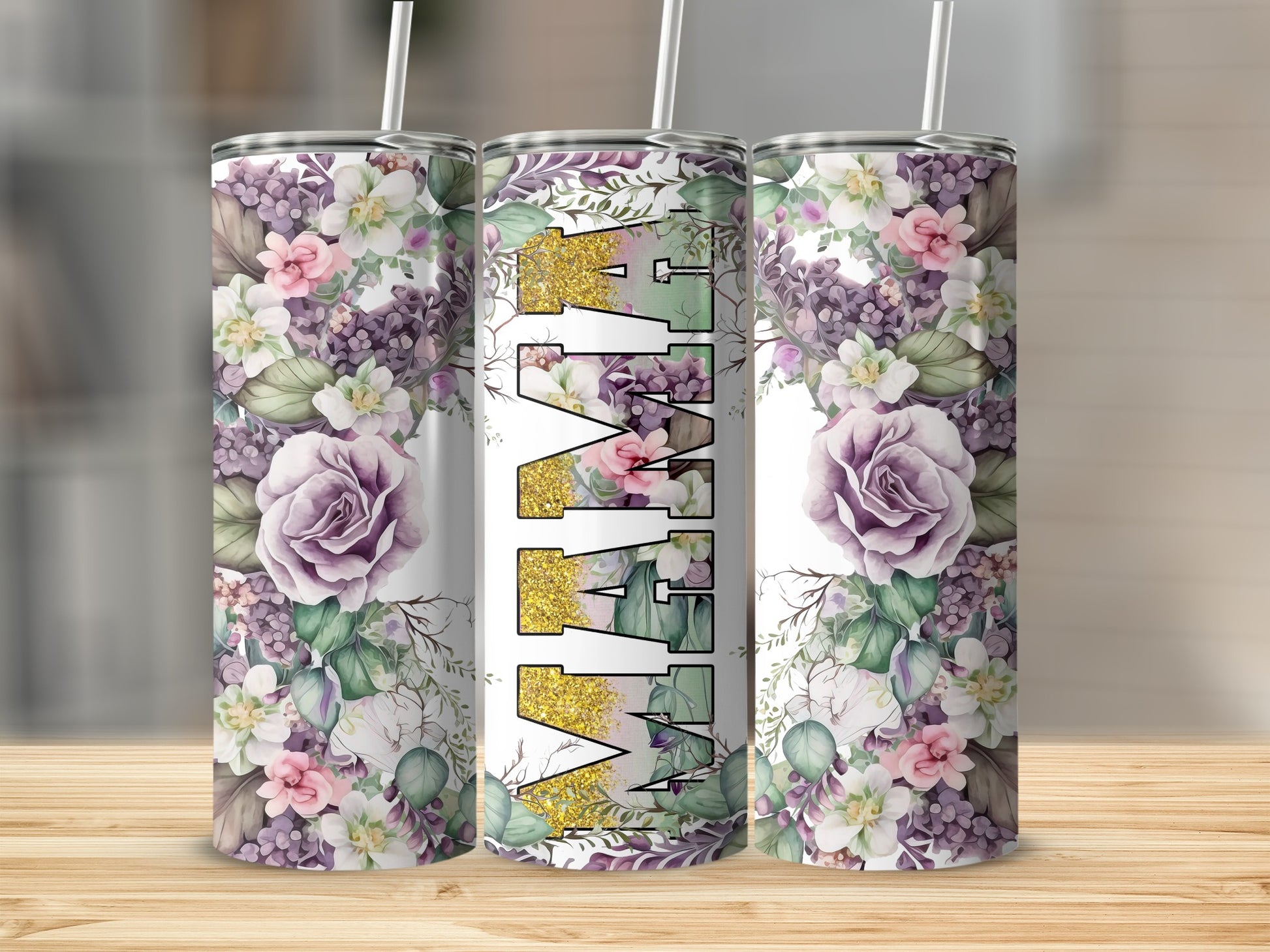 Floral tumbler with "Wife" in gold glitter lettering.
