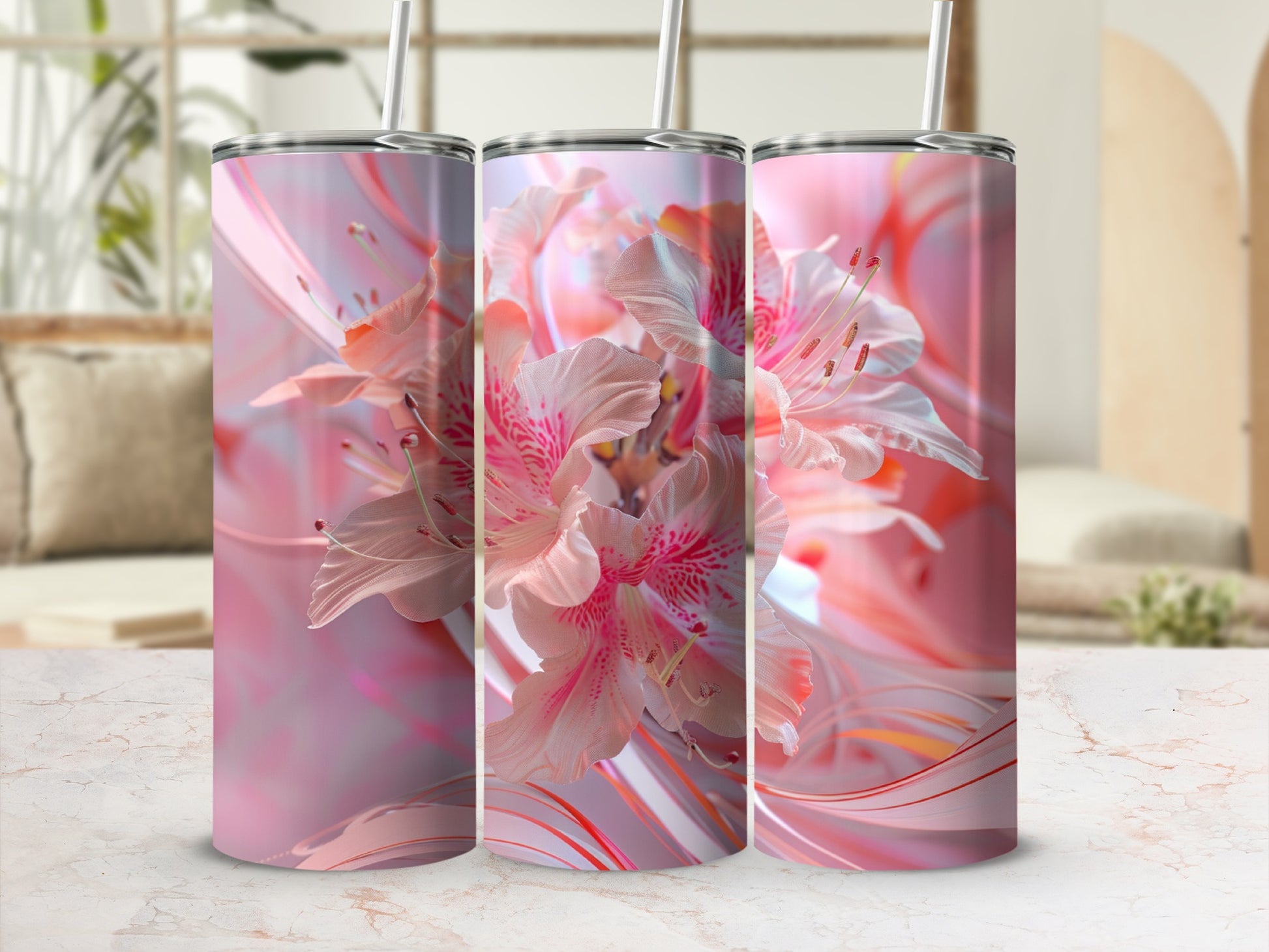 Pink floral pattern on three tumblers with straws.