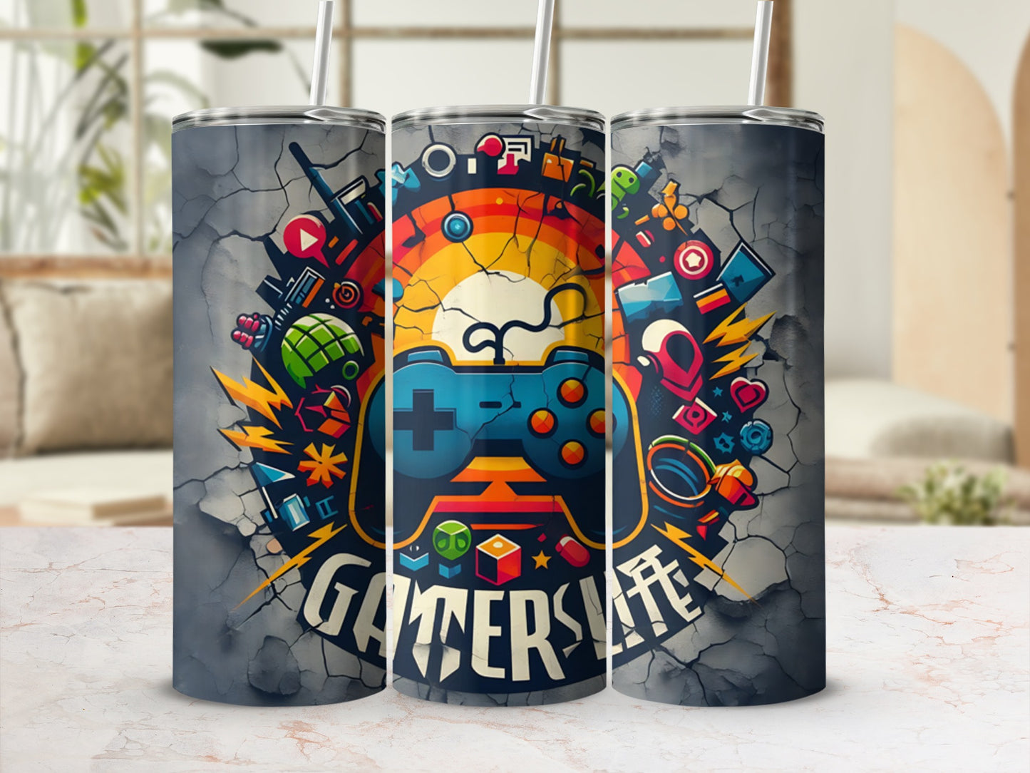 Three gaming-themed tumblers with controllers and game icons on a textured background.