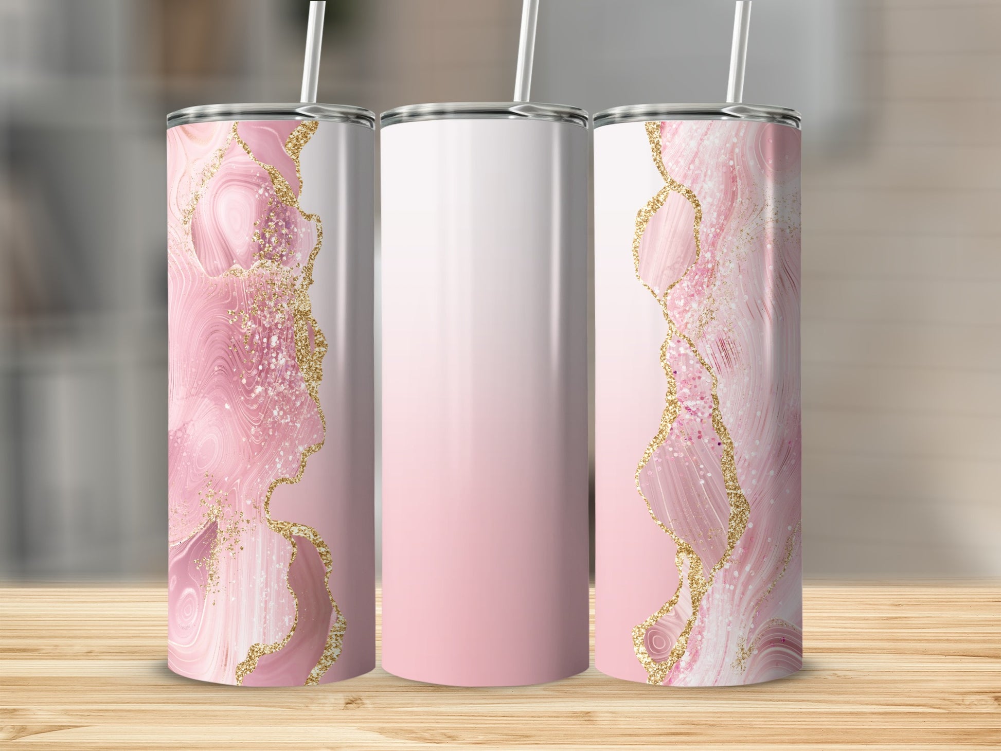 Pink marble tumbler with gold glitter accents and white lid.