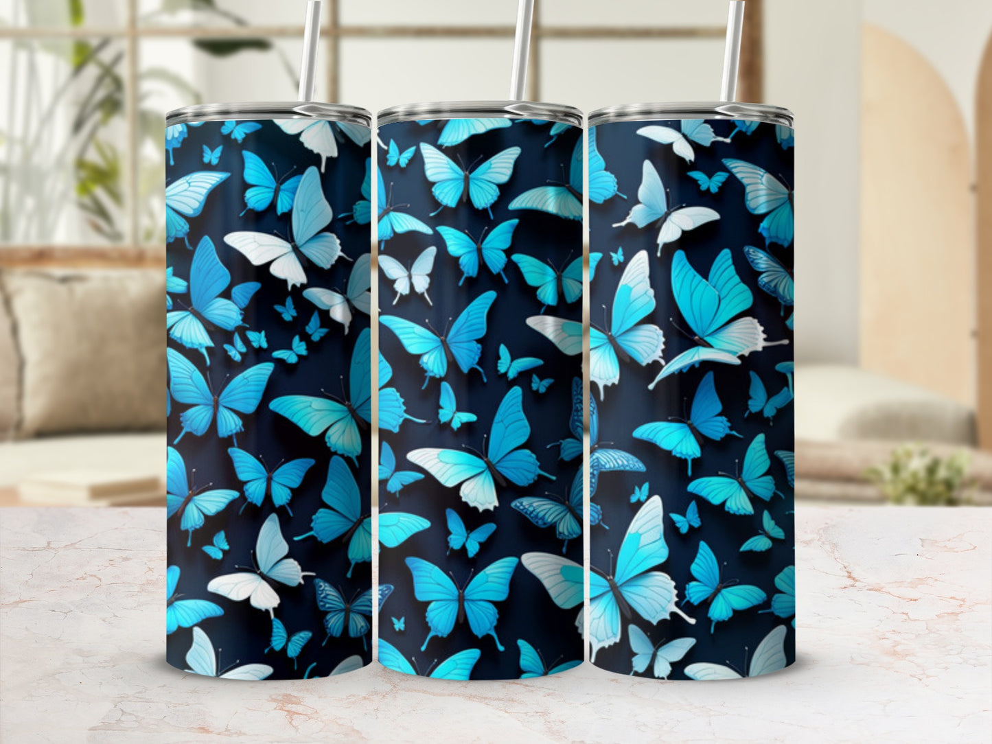 Blue and teal butterflies on a dark background, three tumblers.