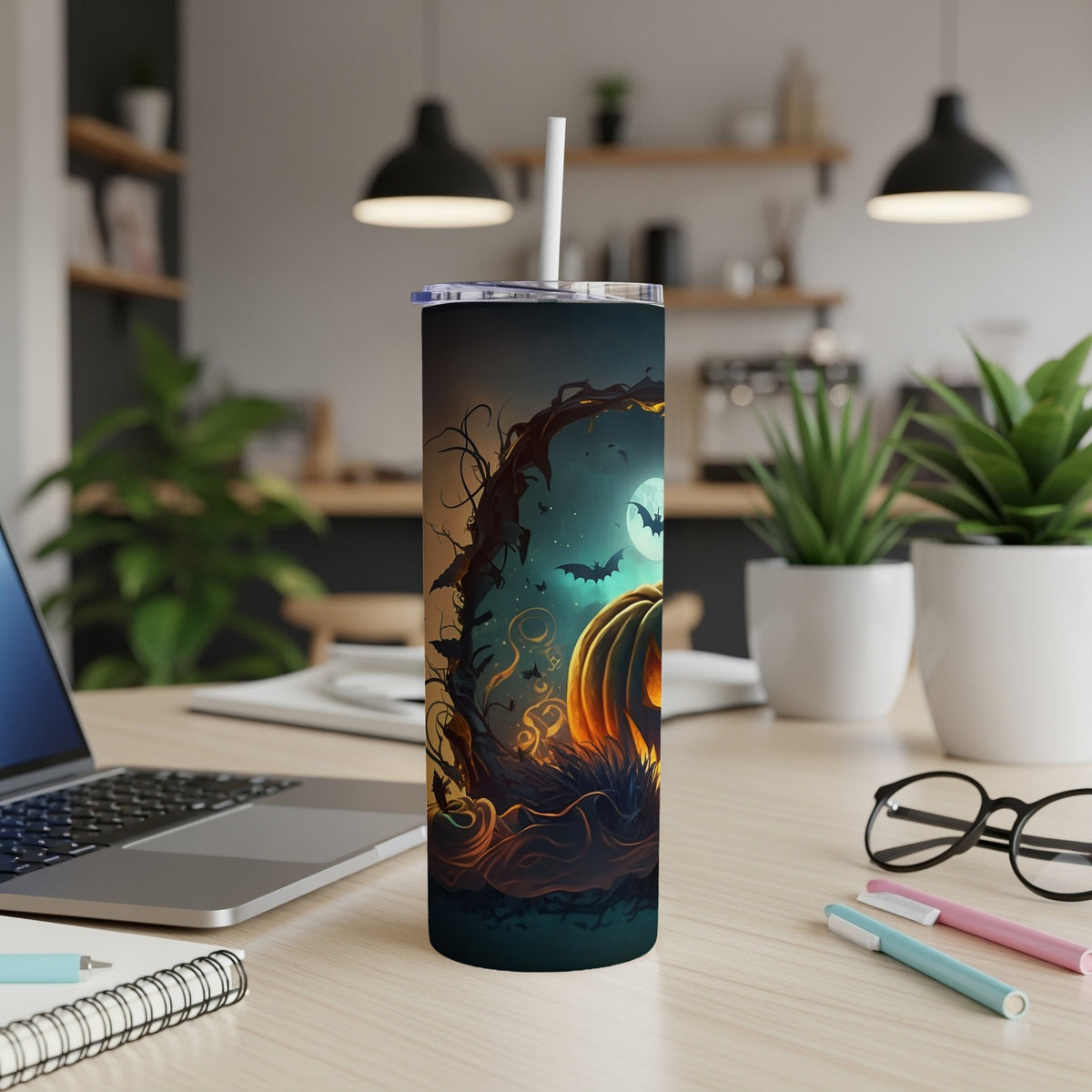 Halloween tumbler with jack-o'-lantern, bats, and moon design.