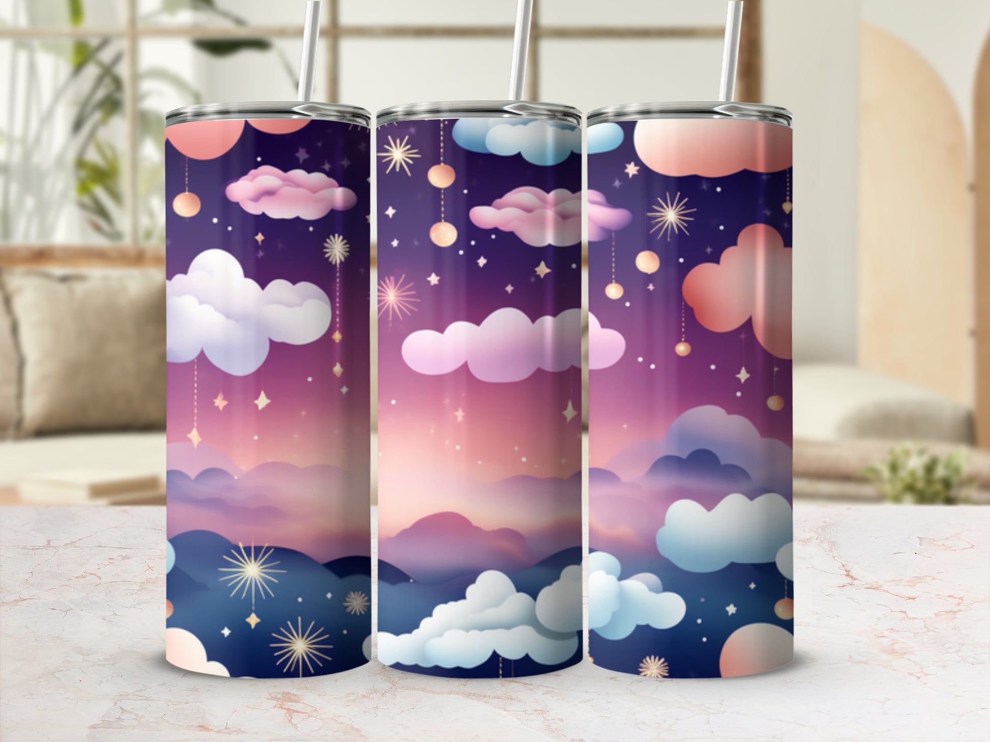 Three tumblers with a starry night sky and cloud pattern.