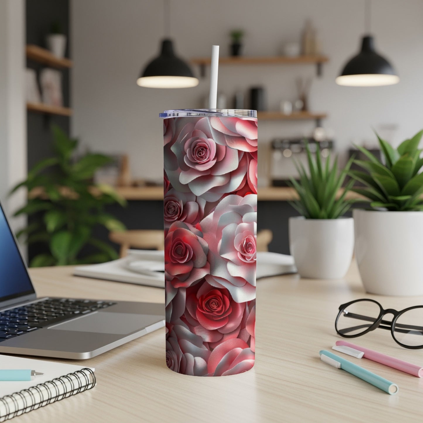 Skinny tumbler with a repeating pattern of red and white roses.