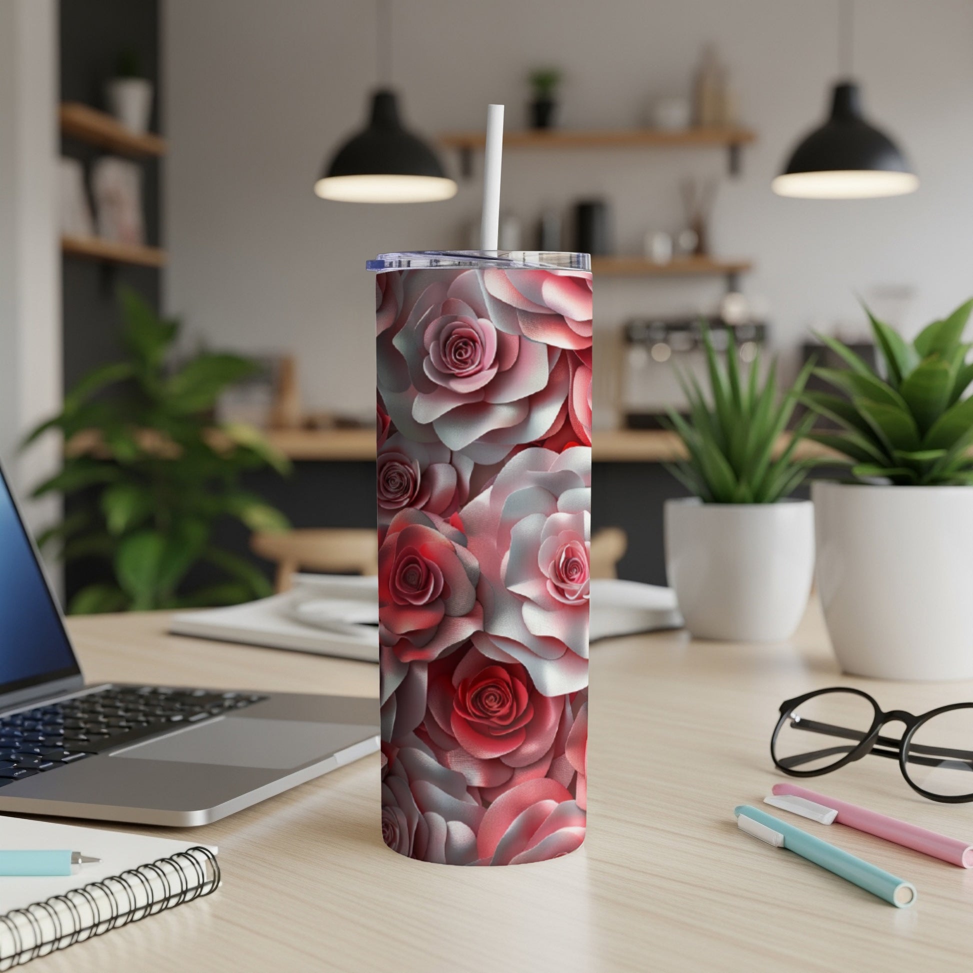 Skinny tumbler with a repeating pattern of red and white roses.