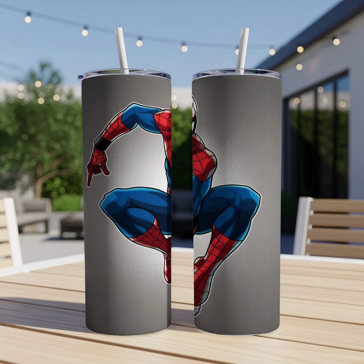 Spider-Man in a dynamic pose on a gray, insulated tumbler with a straw.