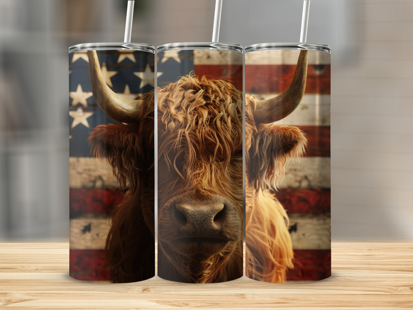 Highland cow with American flag background on three tumblers.