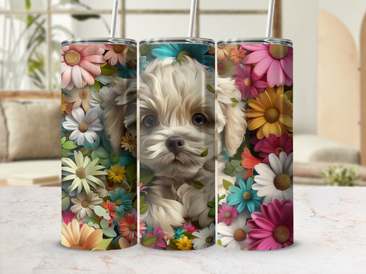 Cute puppy surrounded by colorful flowers on a tumbler.