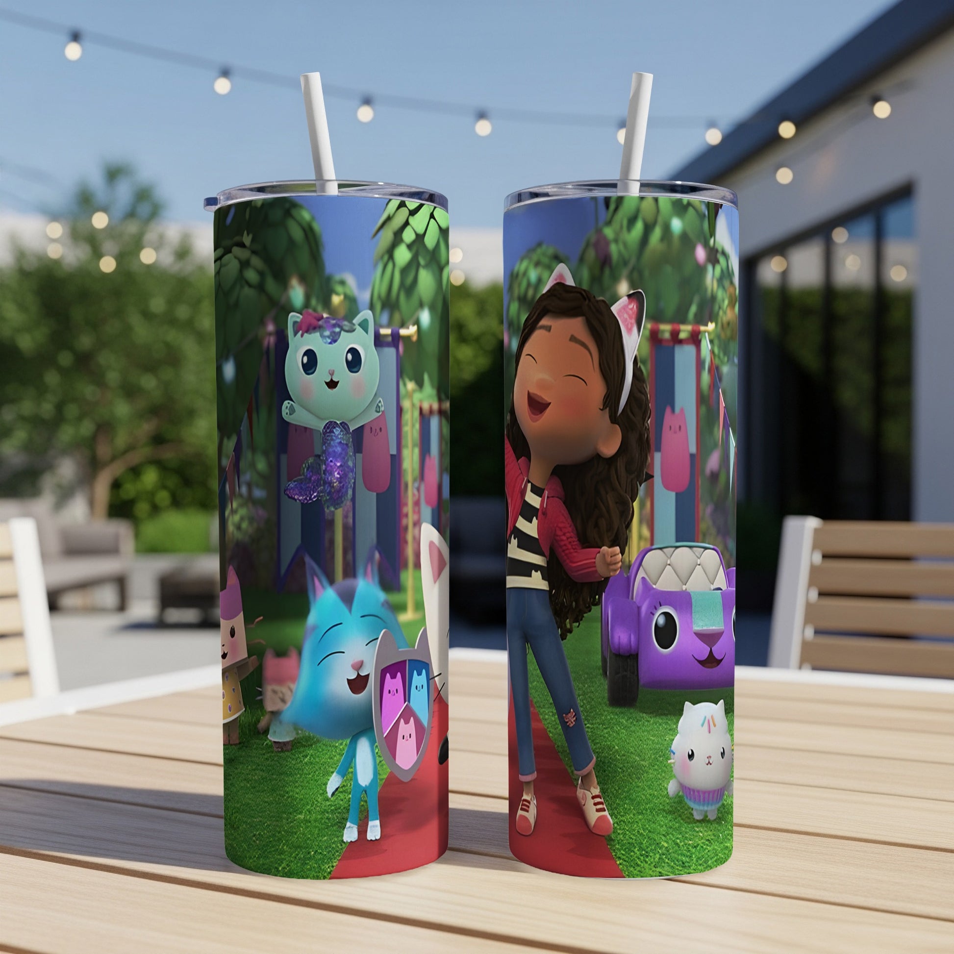 Gabby's Dollhouse characters Gabby and Pandy Paws on a purple and blue tumbler.