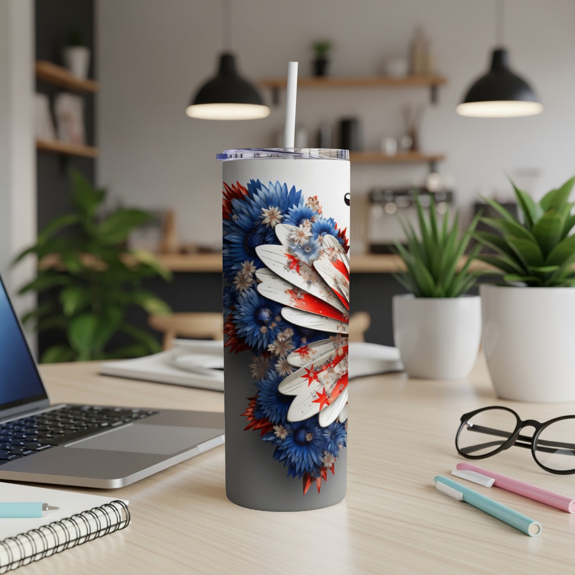 Tumbler with red, white, and blue floral design and American flag accents.