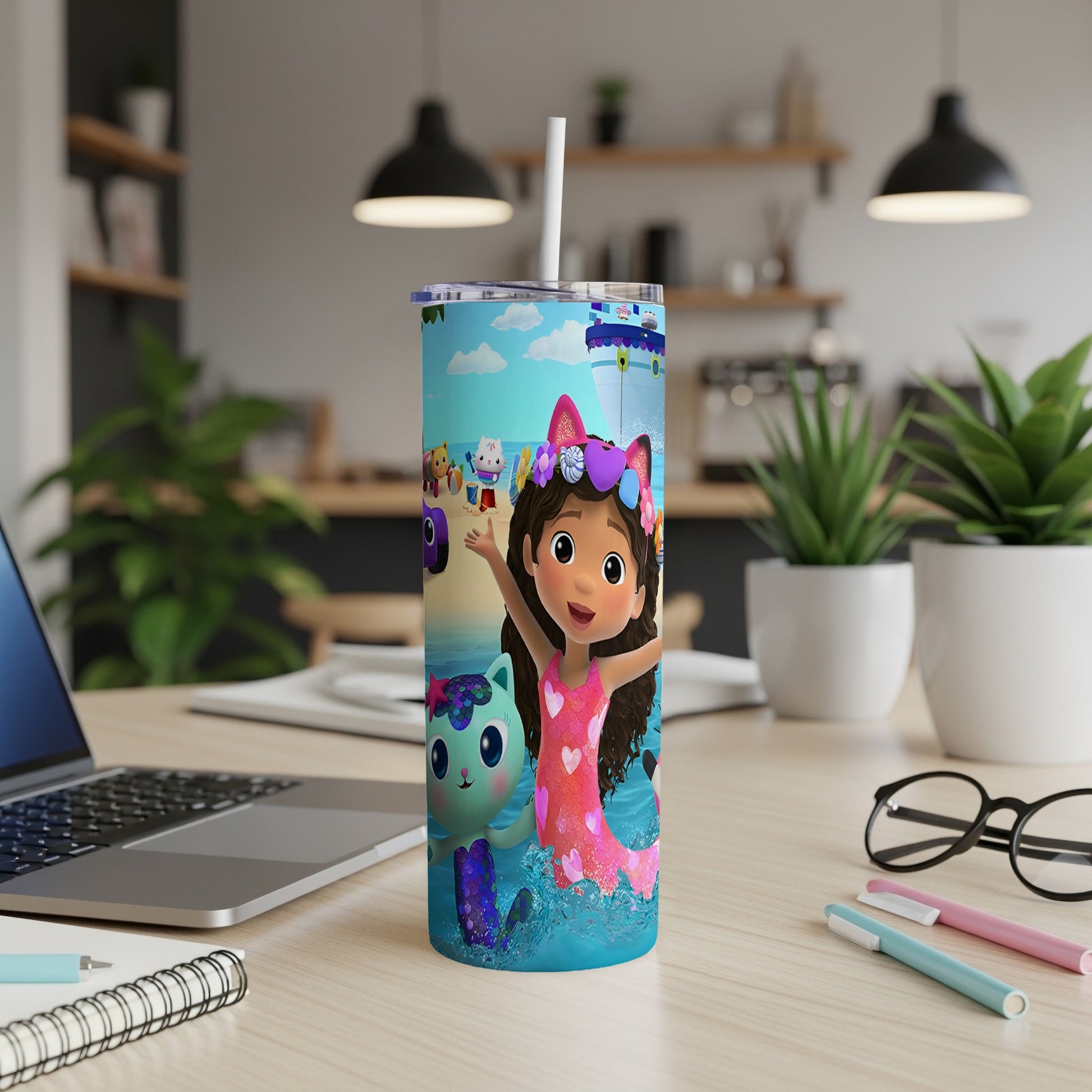 Gabby's Dollhouse characters Gabby and Pandy Paws on a mermaid-themed tumbler.