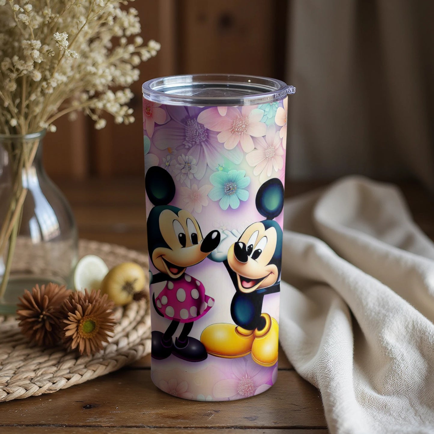 Playful Disney Characters with Floral Background Tumbler