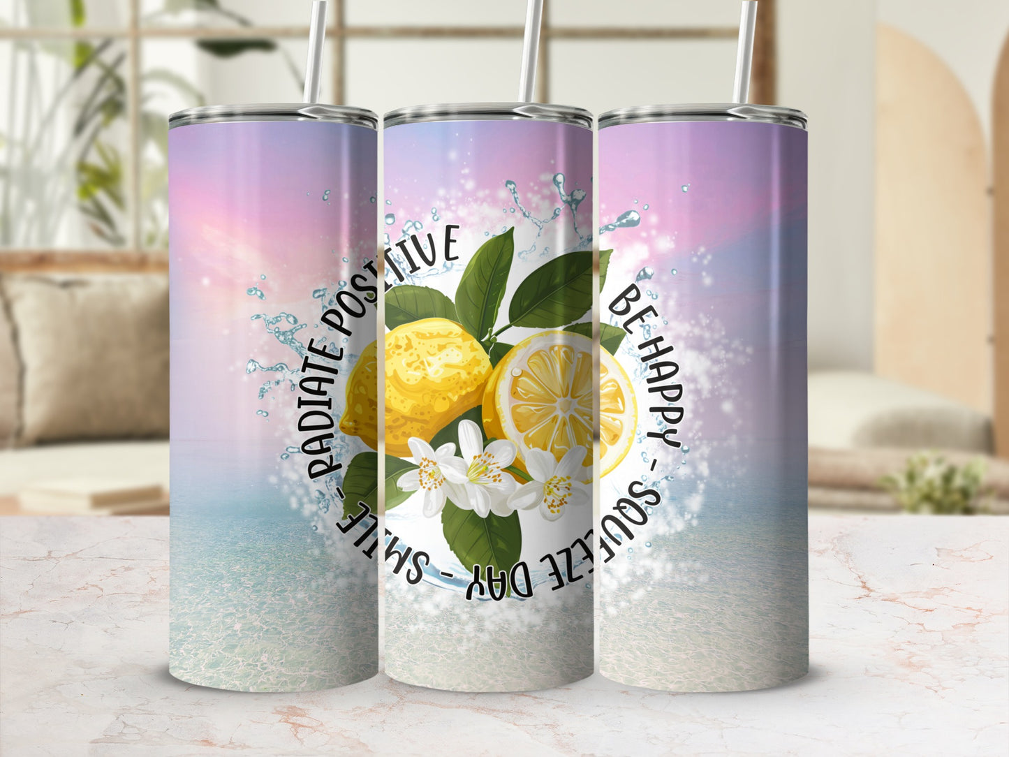 Three tumblers with lemons, flowers, and "Radiate Positive, Be Happy" text.