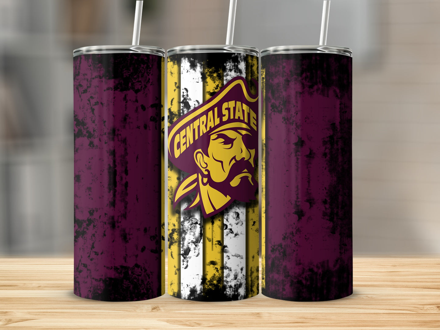 Three tumblers with grunge texture and Central State pirate logo.