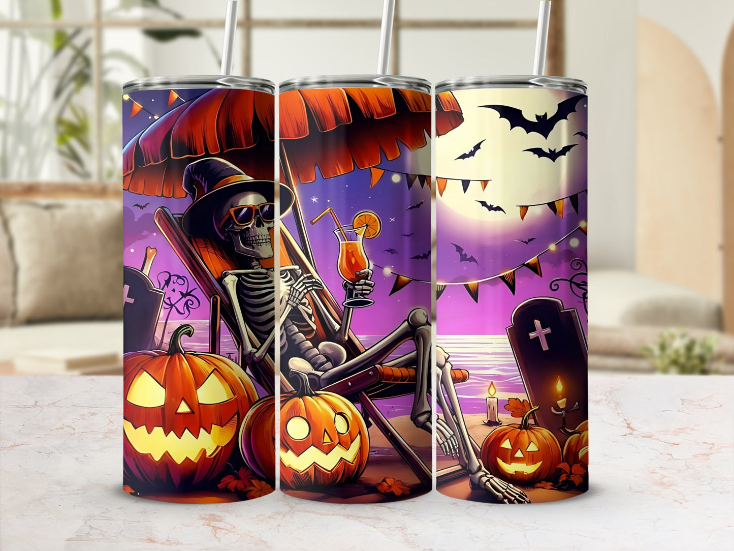 Halloween themed tumbler with skeleton, pumpkins, bats, and moon illustration.
