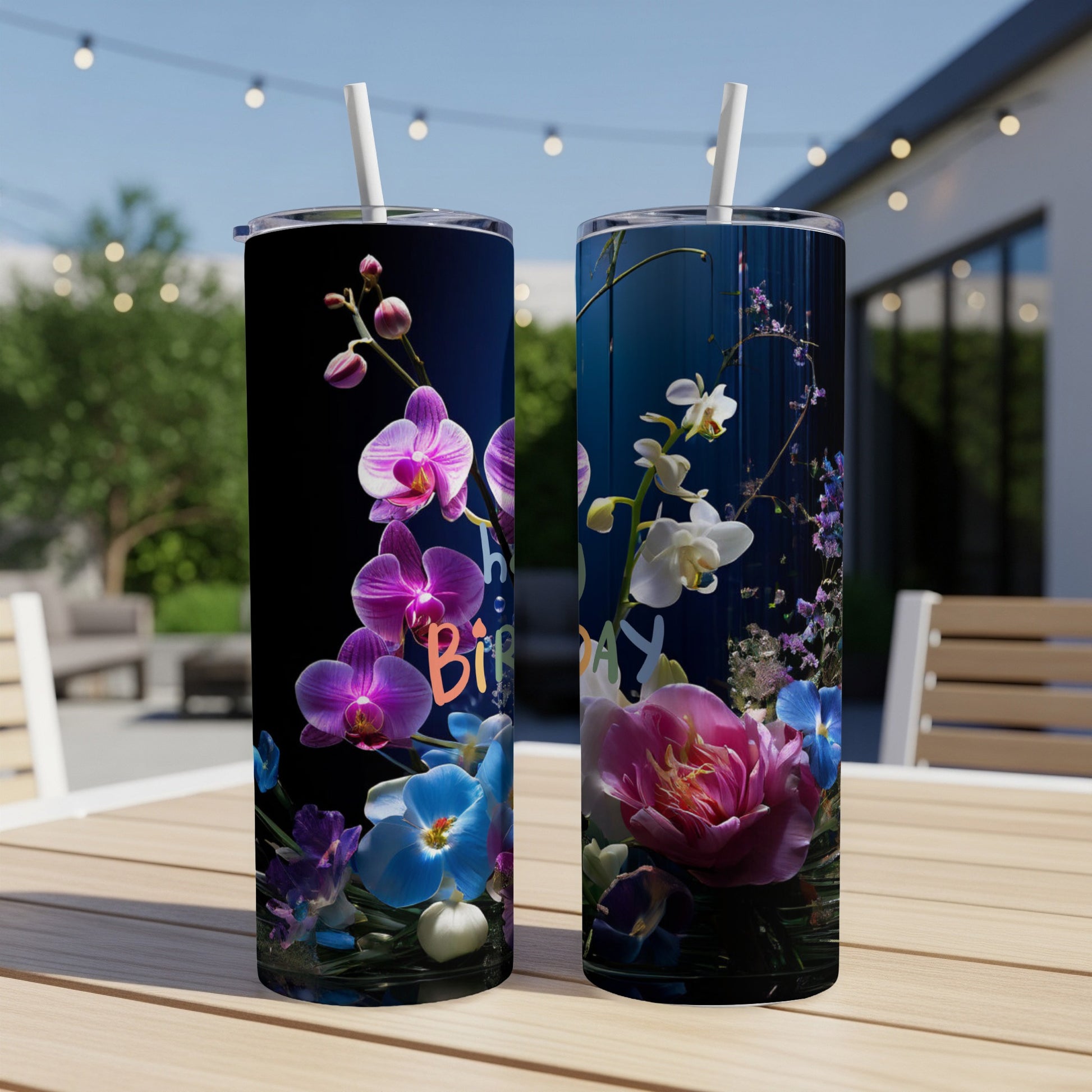 Two tumblers with orchids and blue flowers, one saying "Happy Birthday".