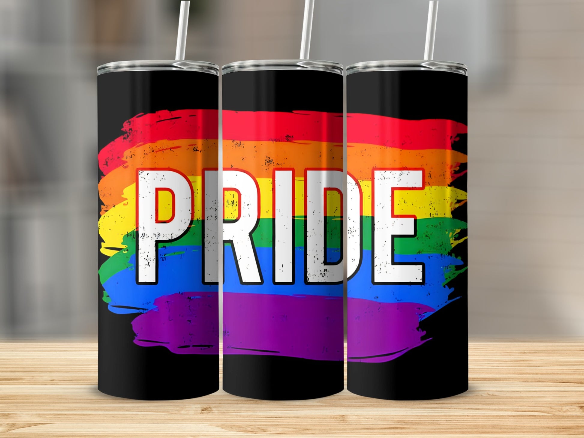 Black tumblers with rainbow pride flag and white "Pride" text.