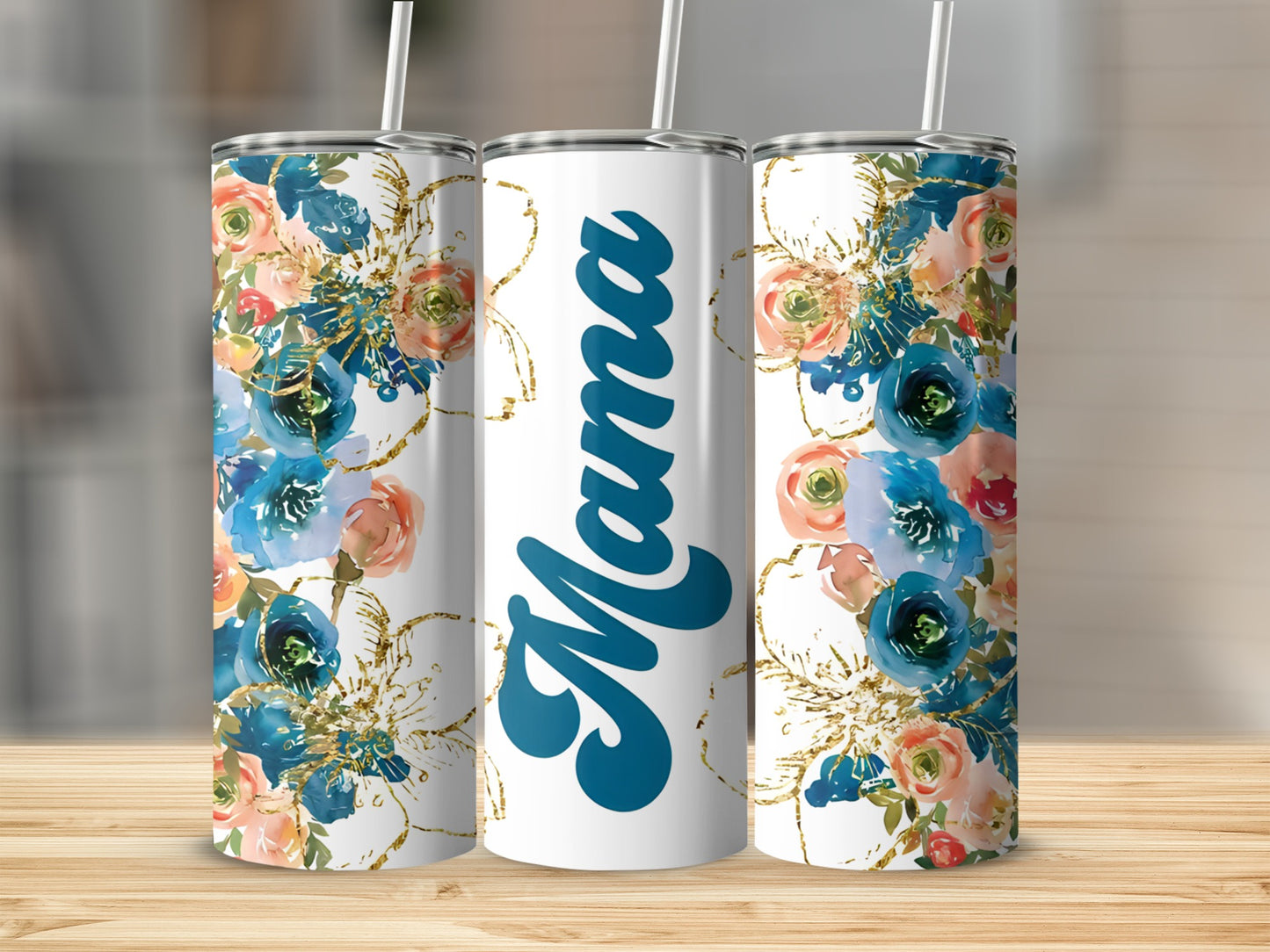 White tumbler with "Mama" in blue script surrounded by floral and gold glitter designs.