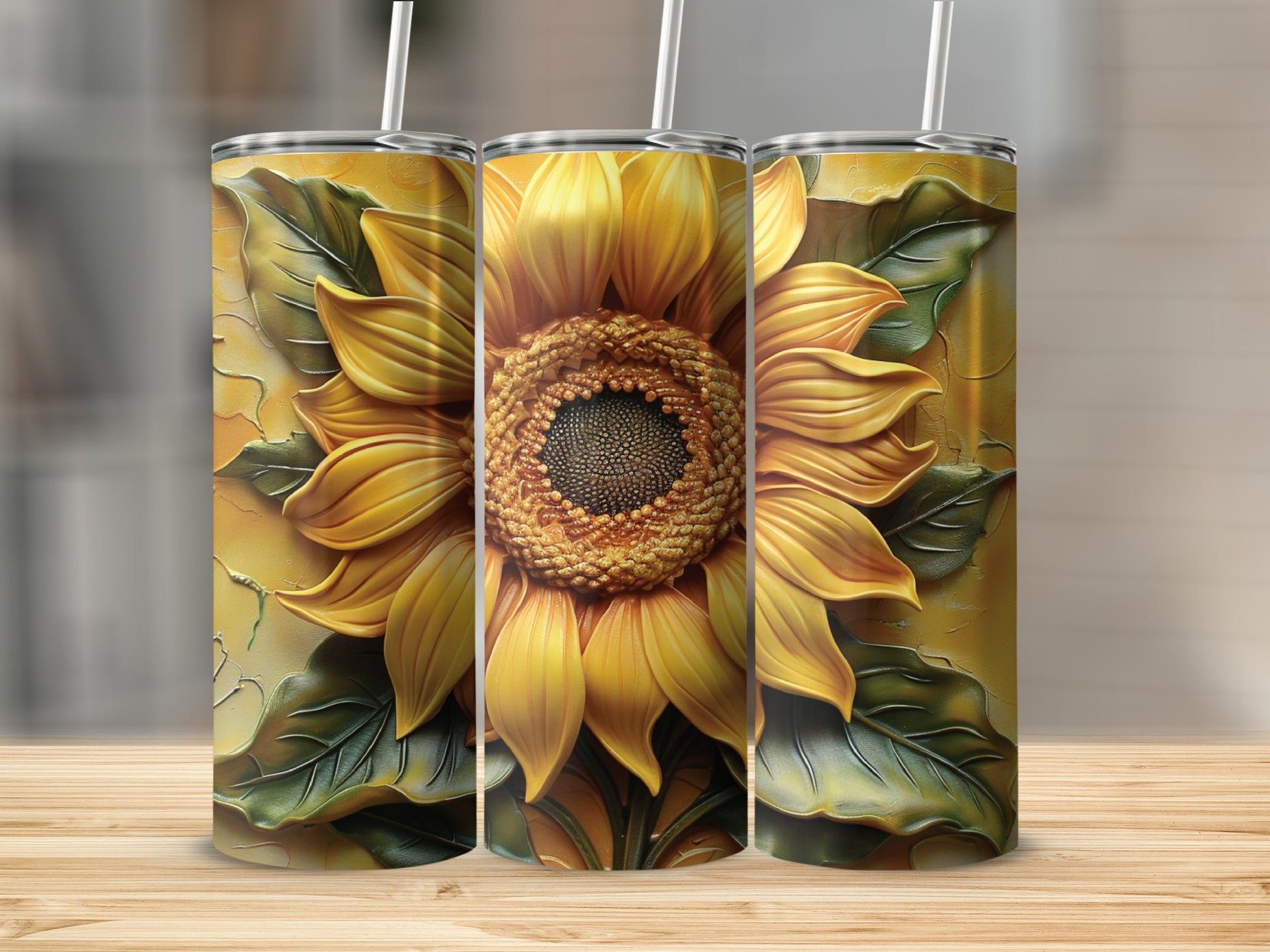 Three sun-themed tumblers with embossed sunflower designs stand on a wooden surface.