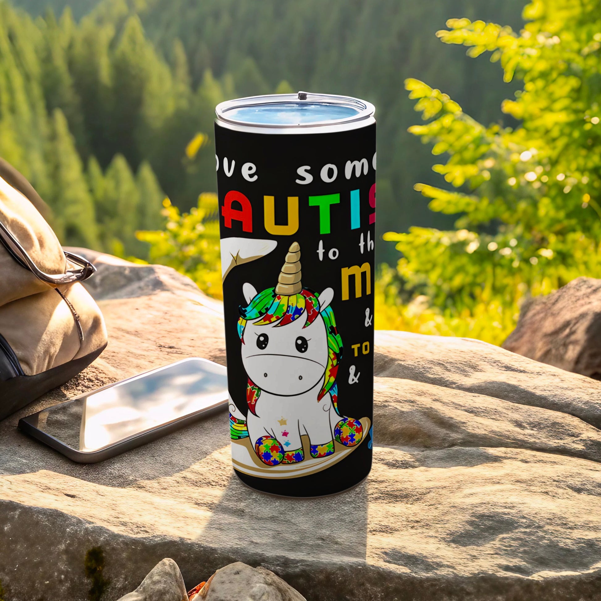 Autism awareness tumbler with unicorn, featuring "Love someone... autism".