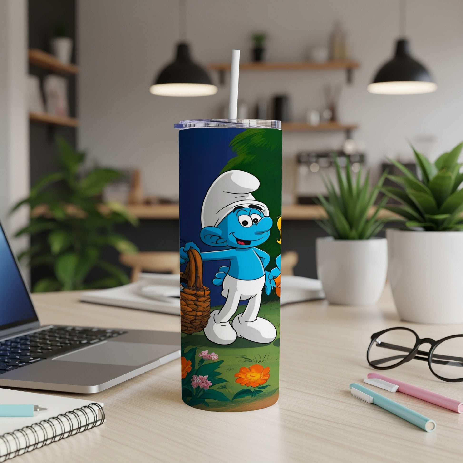 Smurf holding a basket on a table with a laptop and pens.