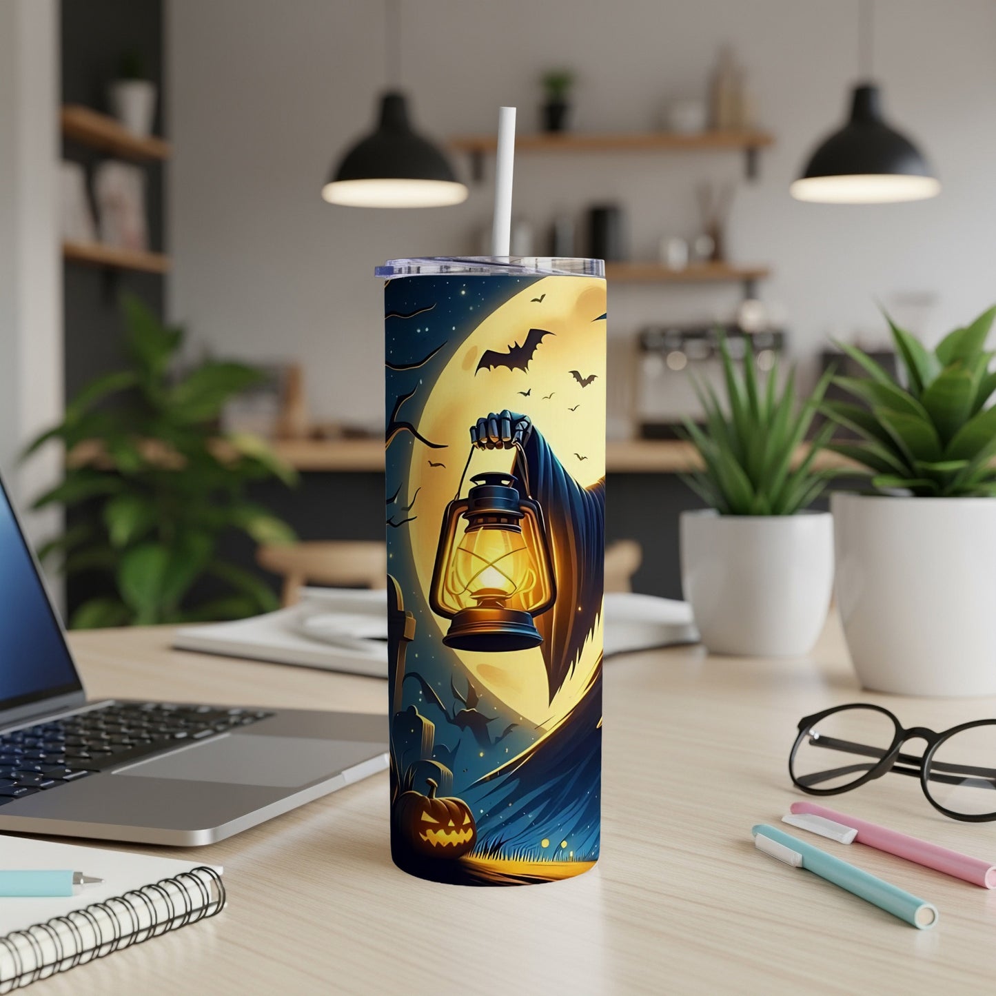 Tall tumbler with Halloween theme art of a grim reaper holding a lantern.