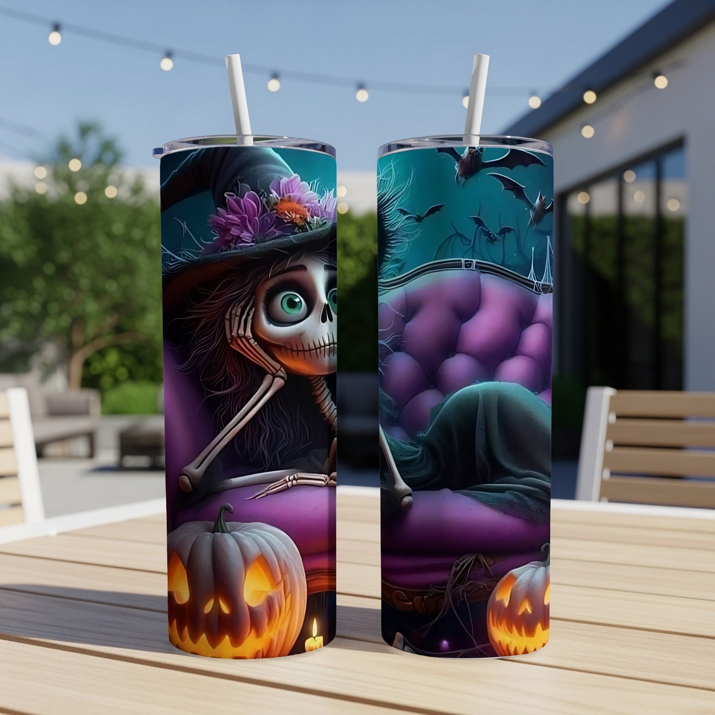 Two tumblers featuring Halloween designs with skeletons, pumpkins, and bats.