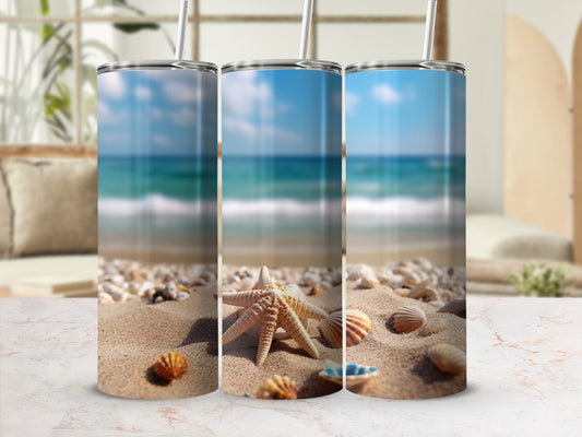 Three tumblers with beach scene, shells, and starfish on sand.