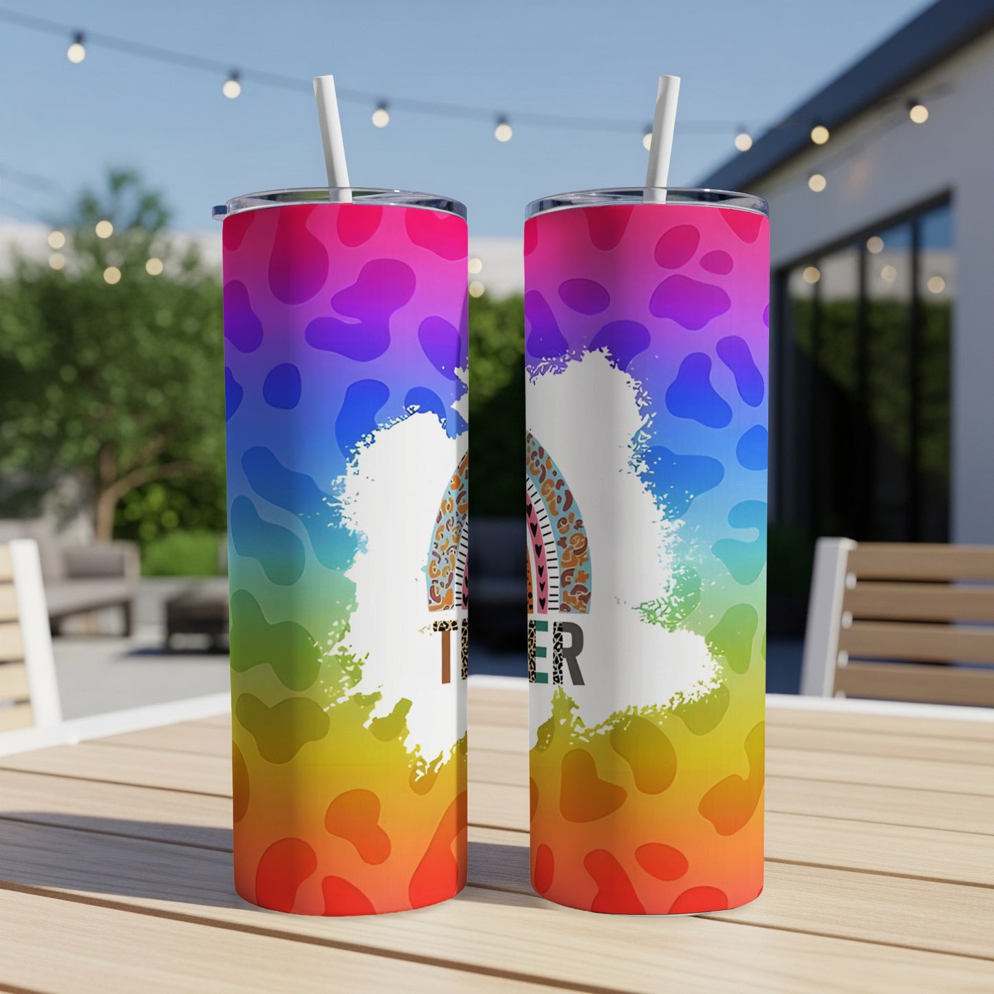Tumbler with rainbow tie-dye design and "Mama" text.