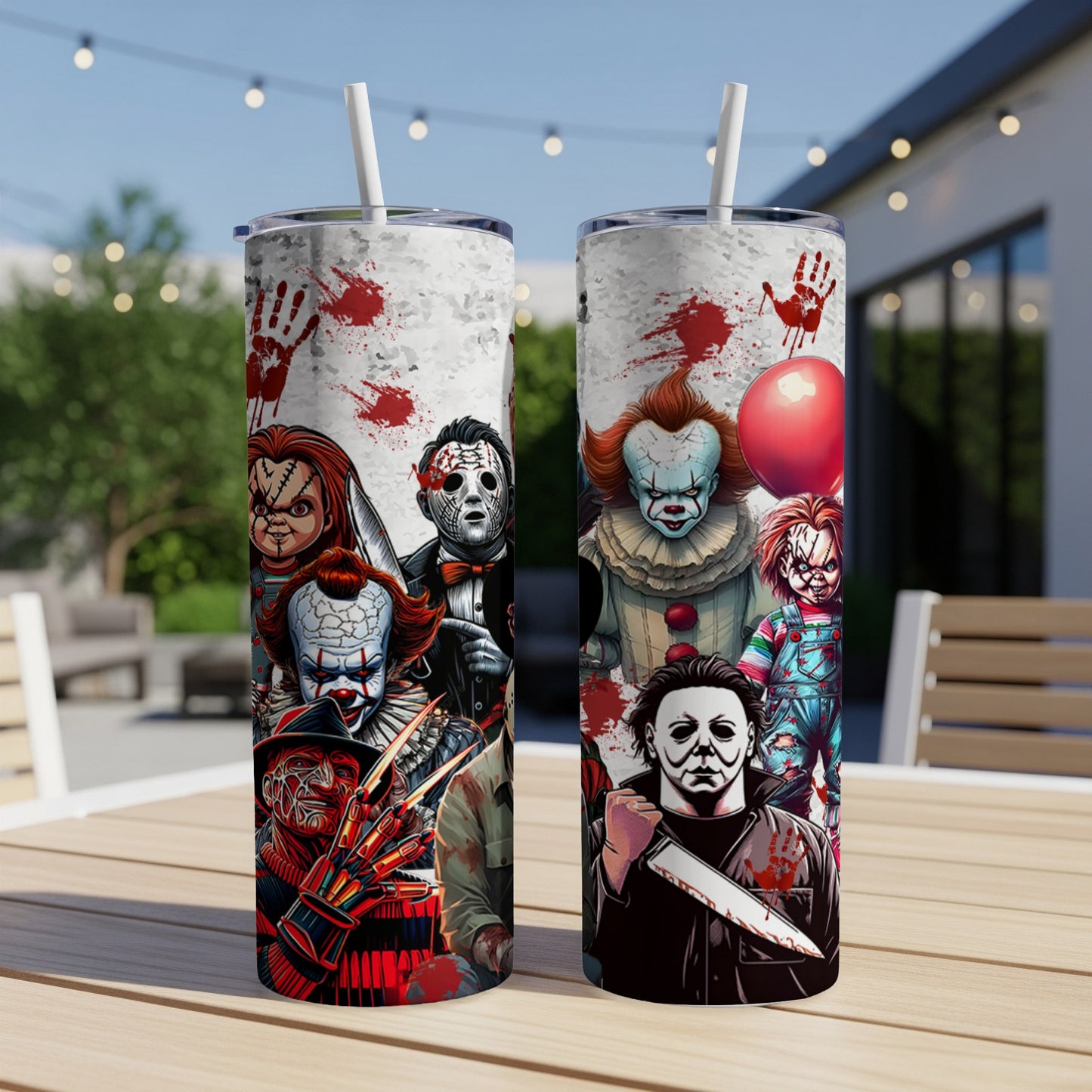 Horror movie characters on a white tumbler with red handprints.