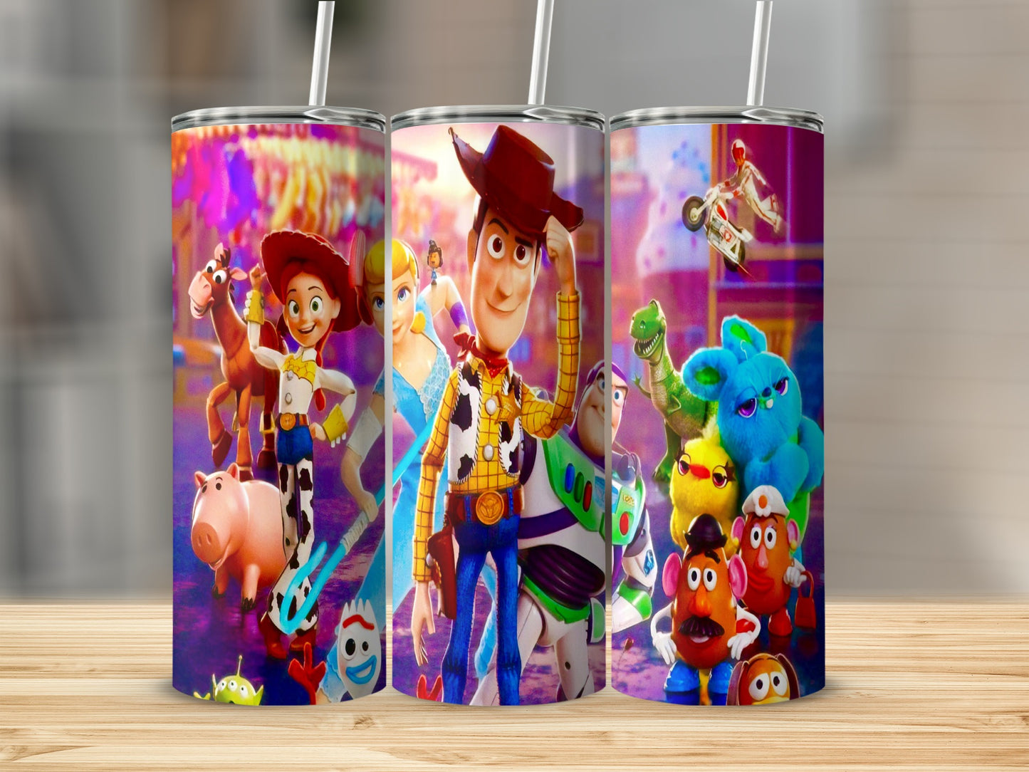 Toy Story characters Woody, Buzz, Jessie, and others on a tumbler.