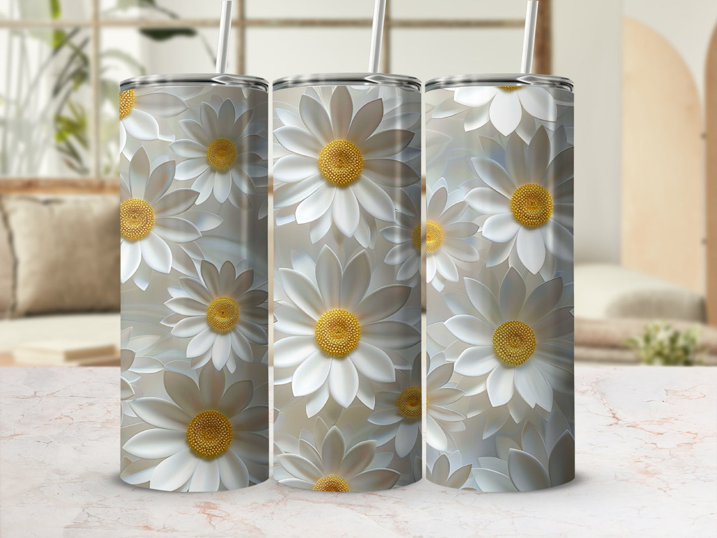 Three tumblers featuring a repeating pattern of white daisies with yellow centers.