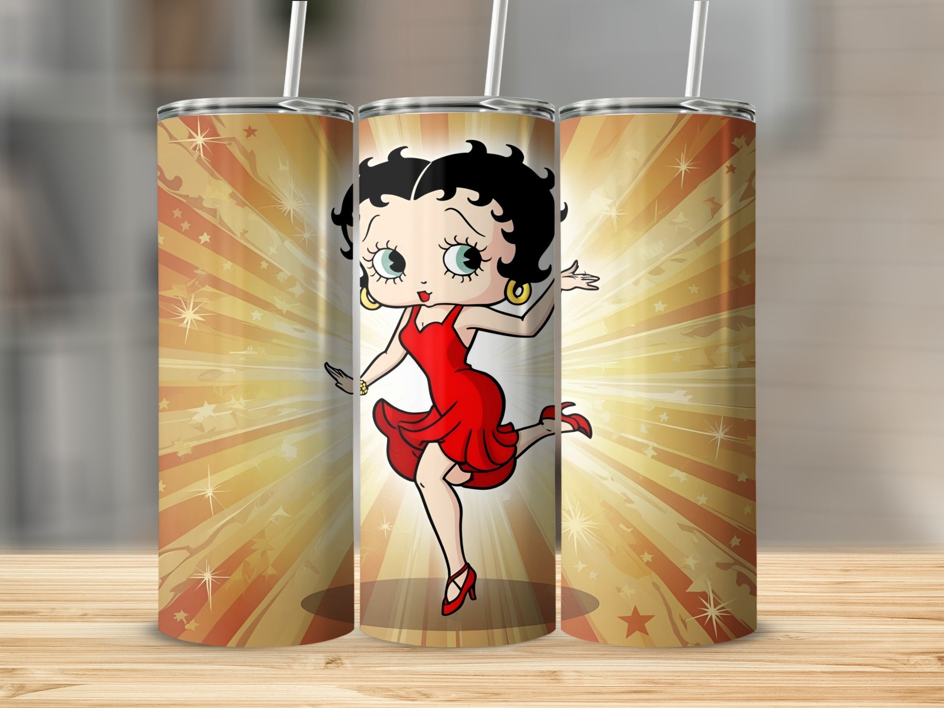 Betty Boop in a red dress dancing on a stage with starbursts.