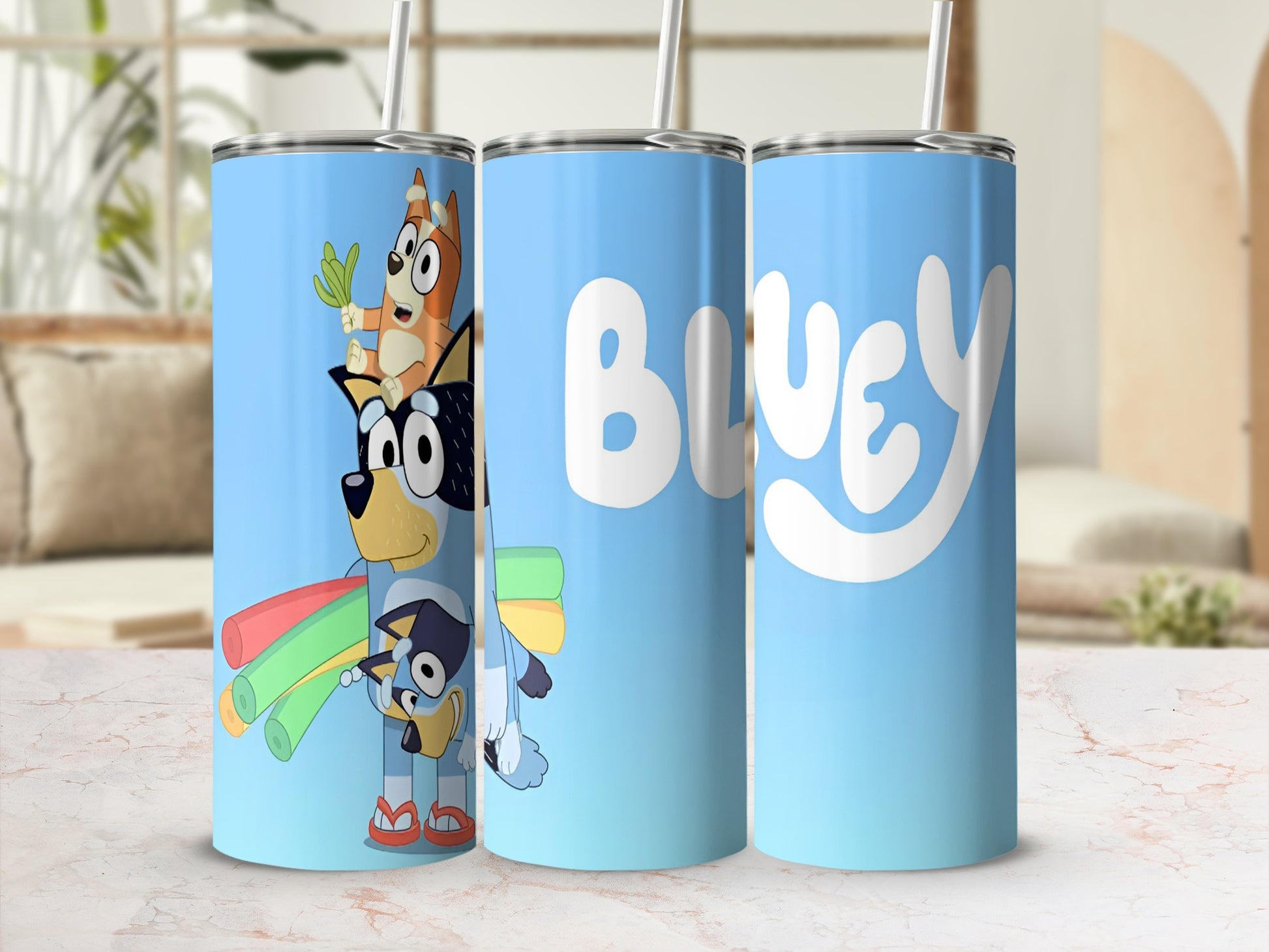 Bluey characters on a blue tumbler with white Bluey logo.