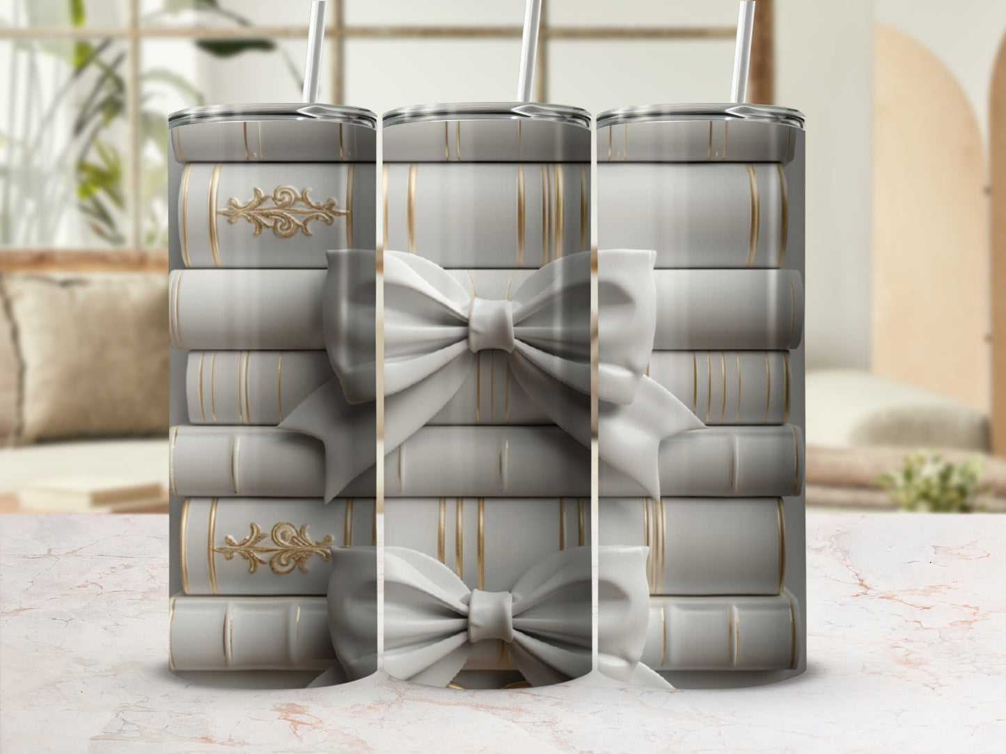 Stack of white tumblers with gold ribbon and bow details.