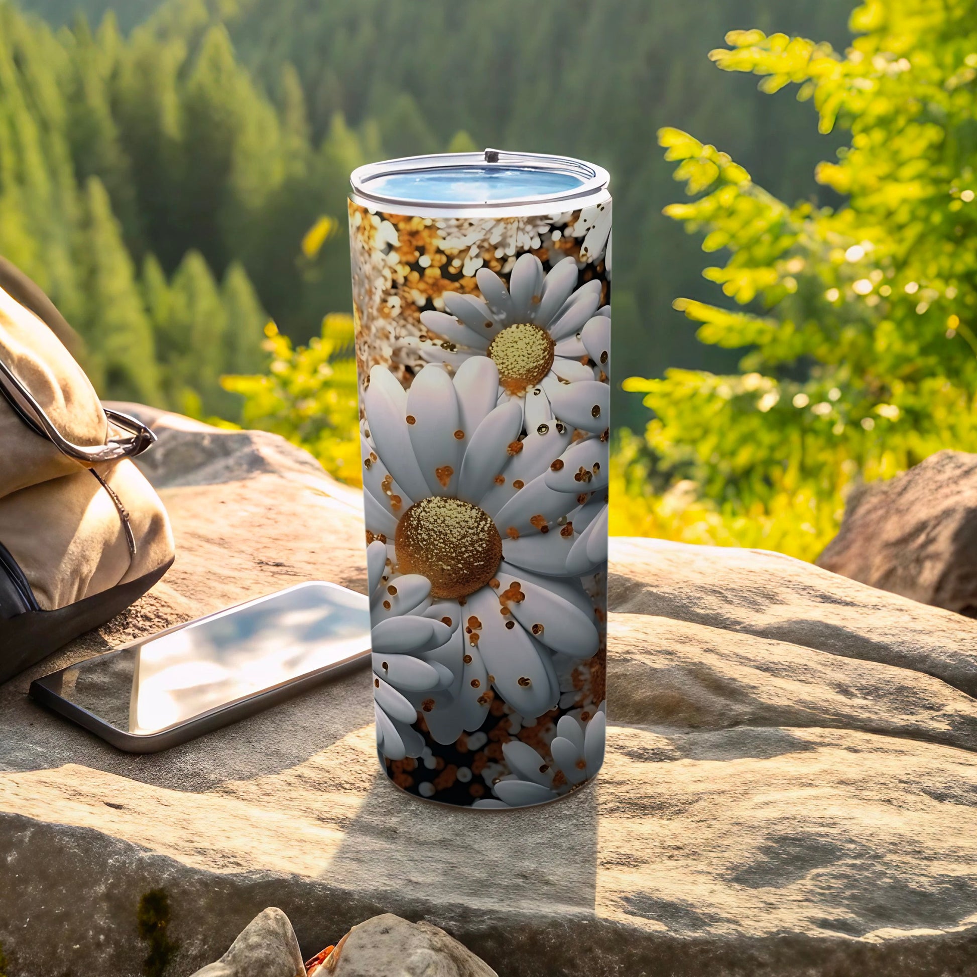 White daisy flowers with gold glitter pattern on a stainless steel tumbler.