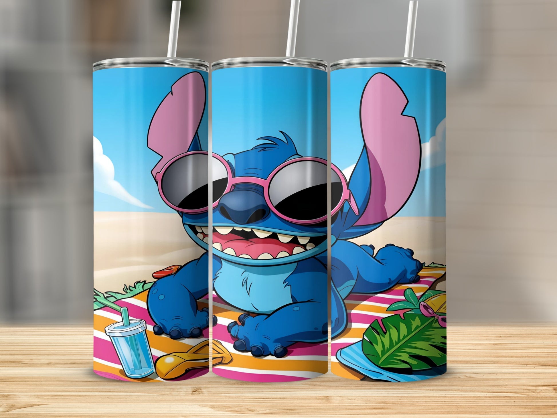 Stitch on a beach towel with sunglasses and tropical foliage.