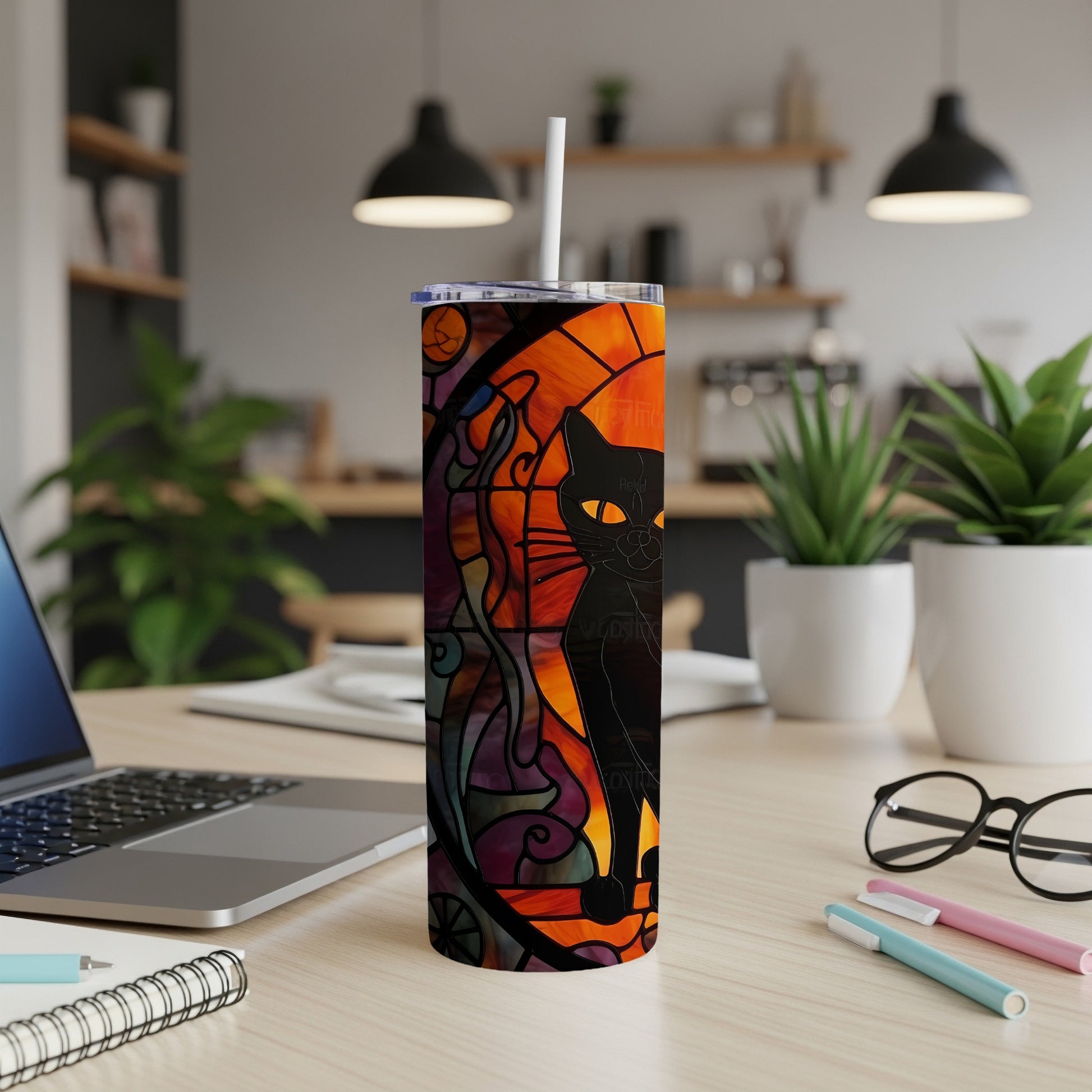 Black cat with stained glass pattern on a tumbler cup.