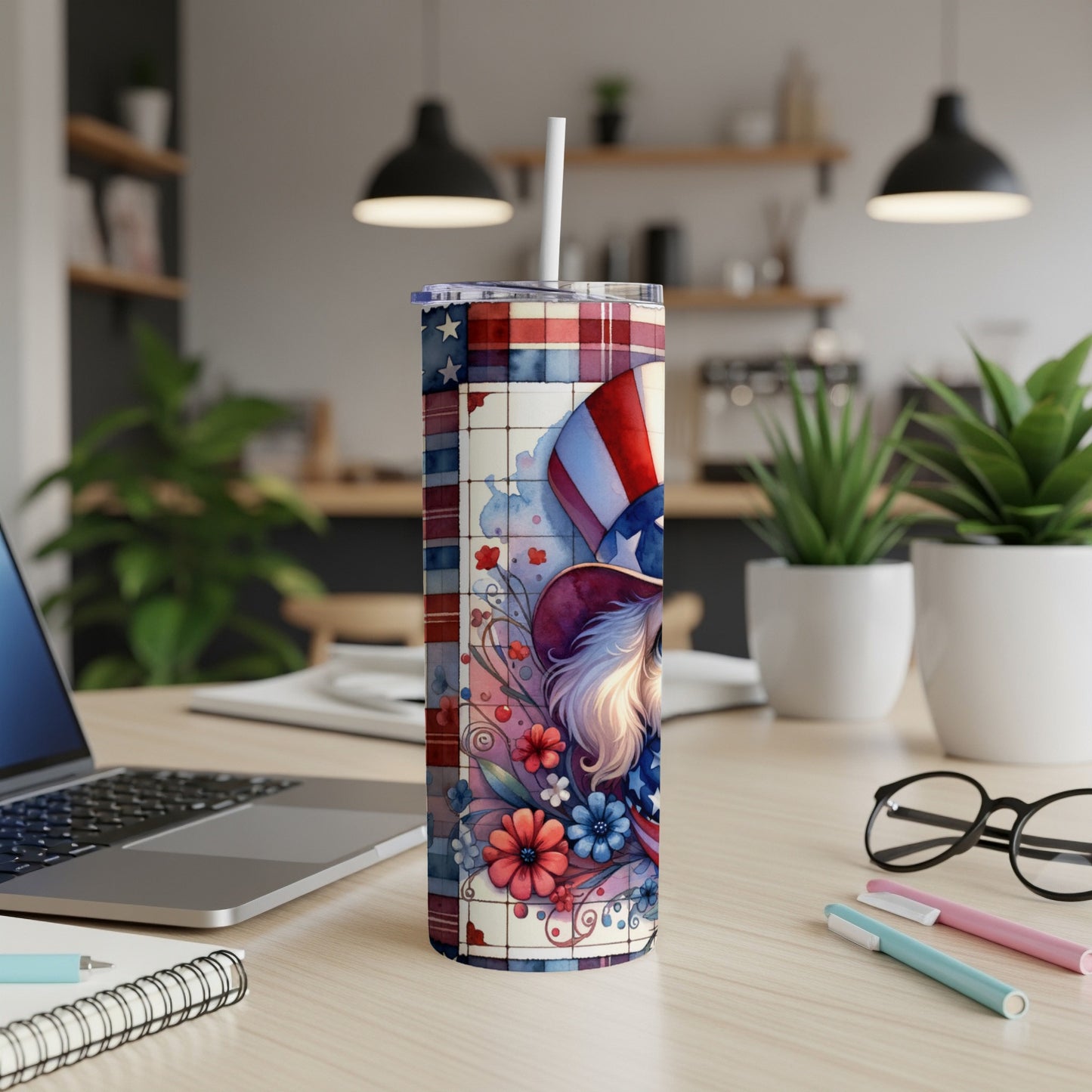Tumbler with patriotic dog, stars, and flowers pattern.