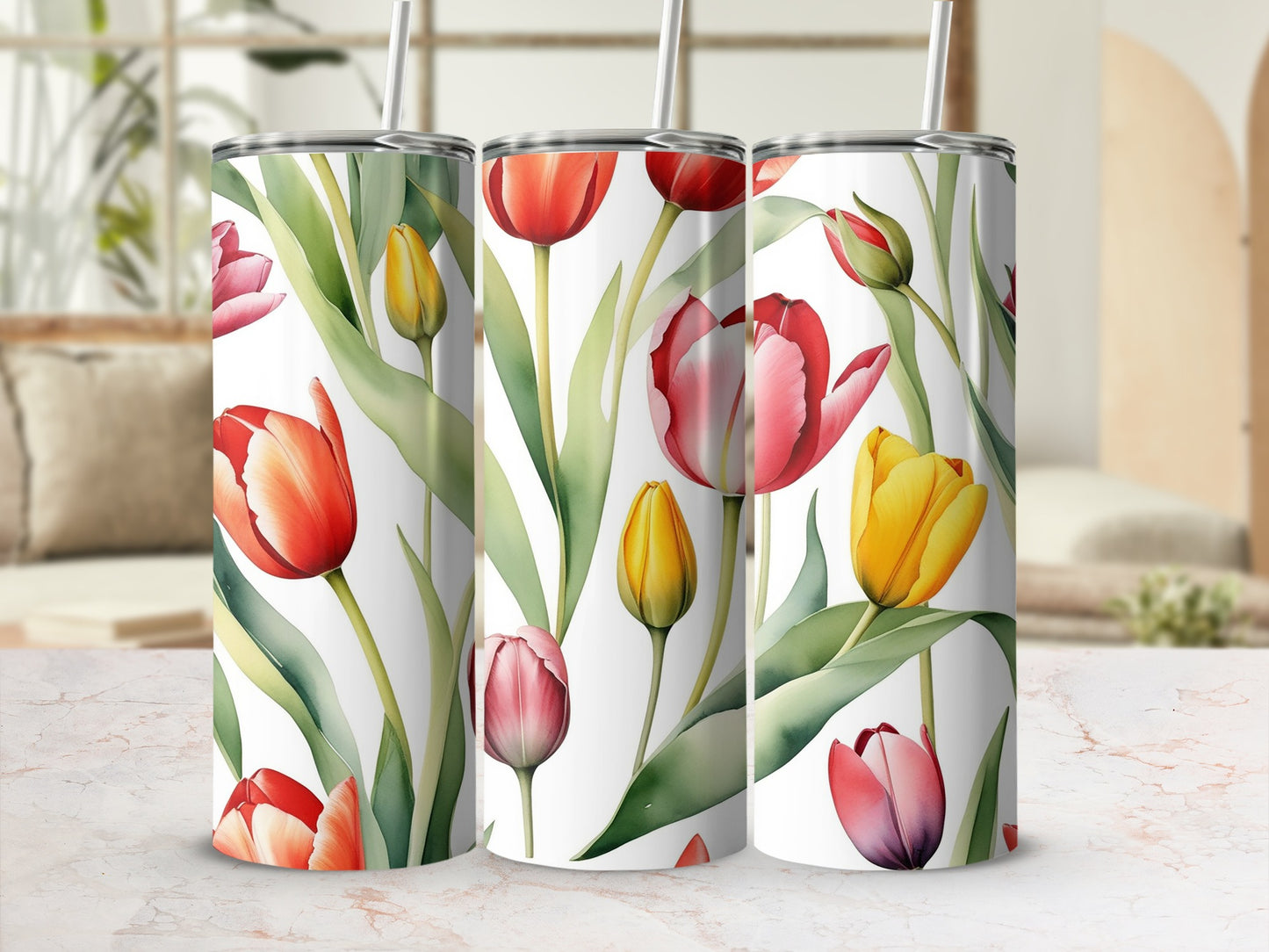 Tumblers with a watercolor floral pattern featuring red and yellow tulips.