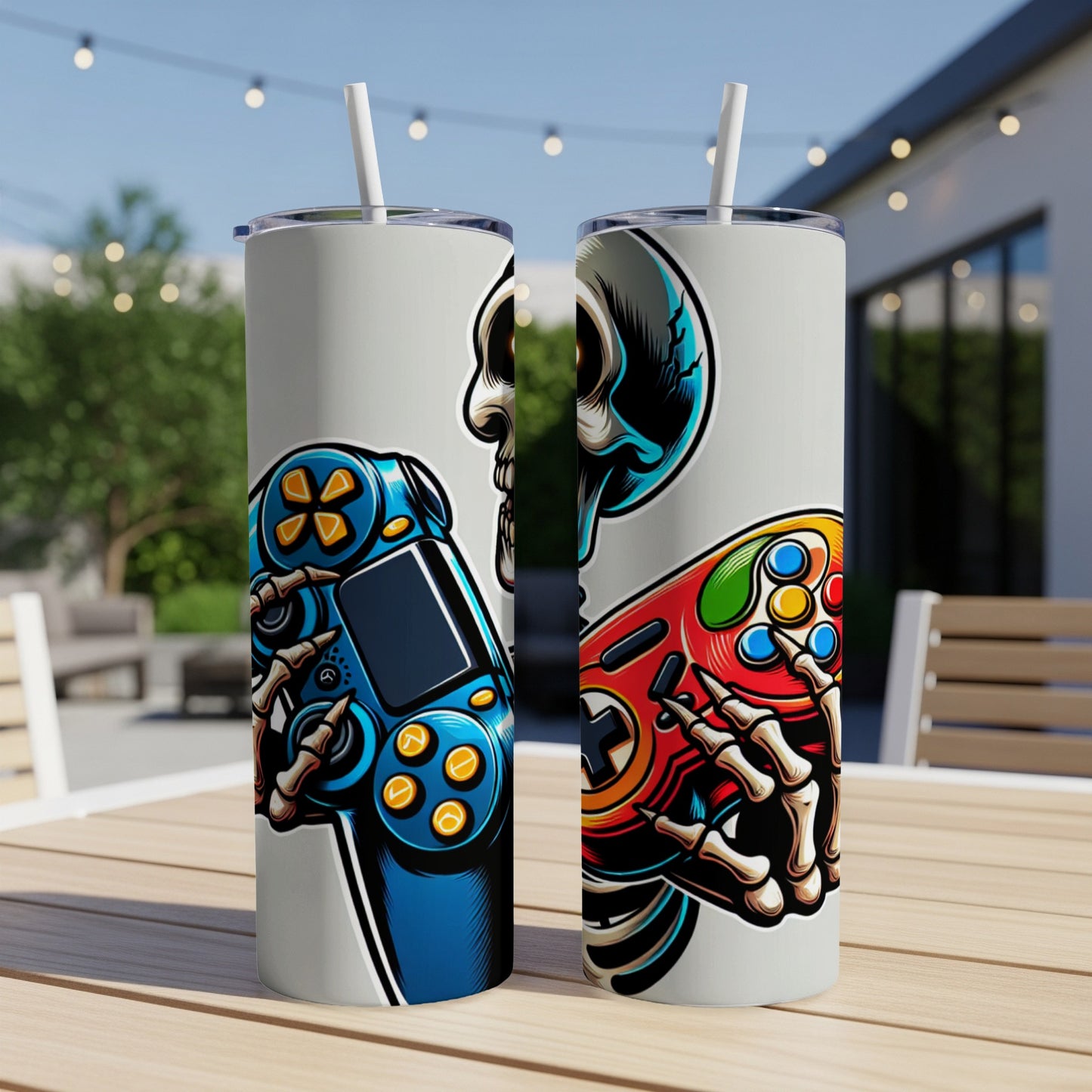Skeleton hands holding blue and red video game controllers on tumblers.