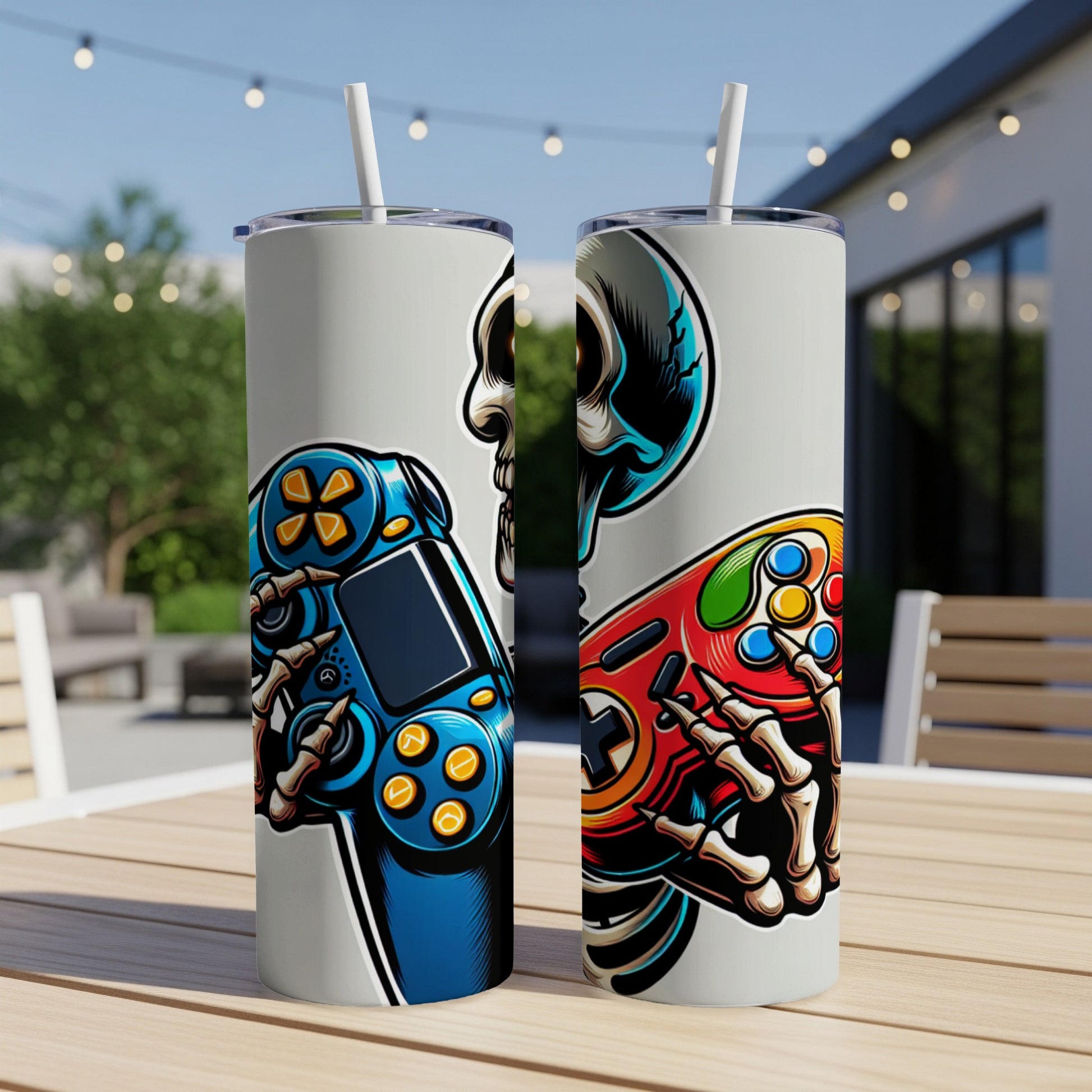 Skeleton hands holding blue and red video game controllers on tumblers.