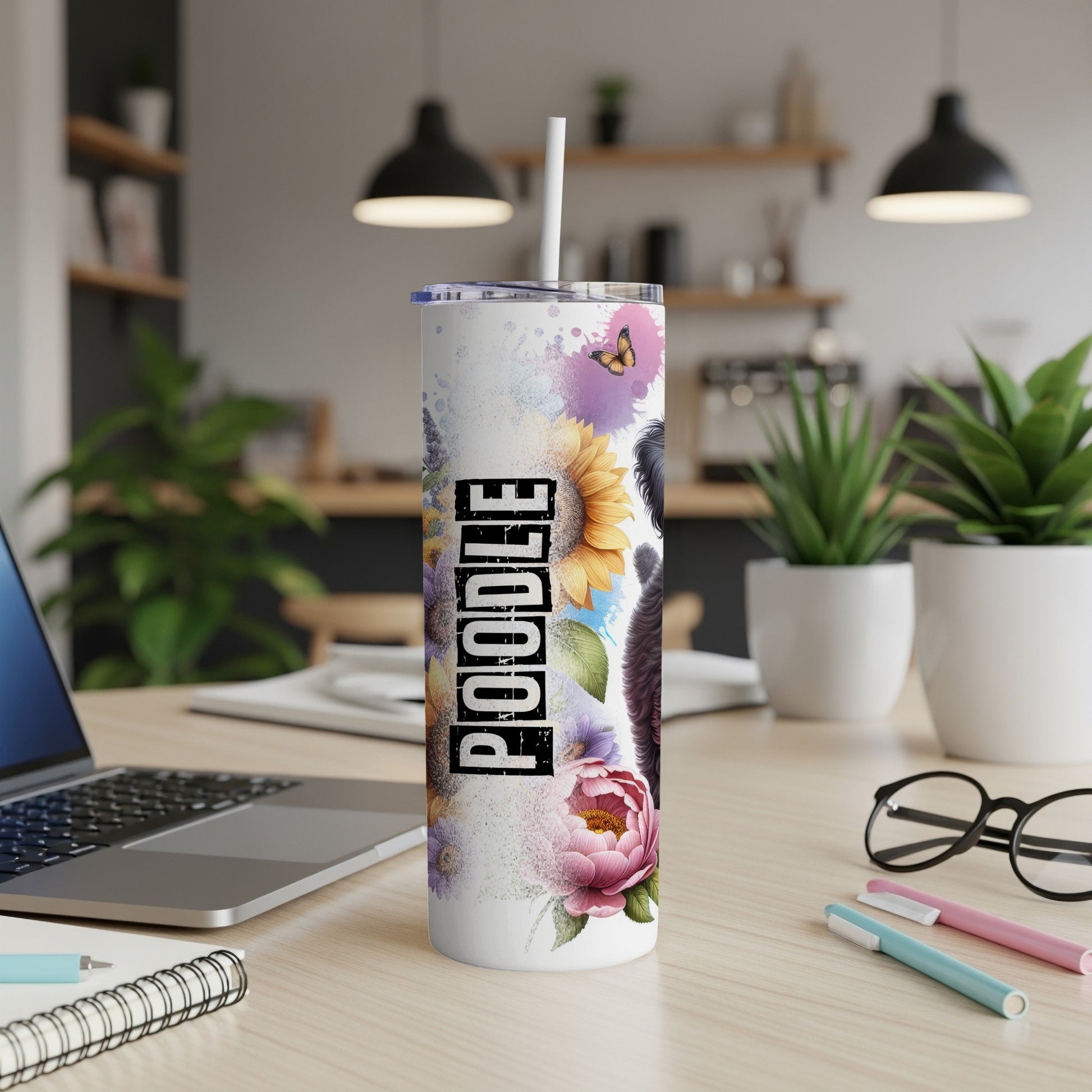 White tumbler with "POODLE" text, floral accents, and a butterfly.