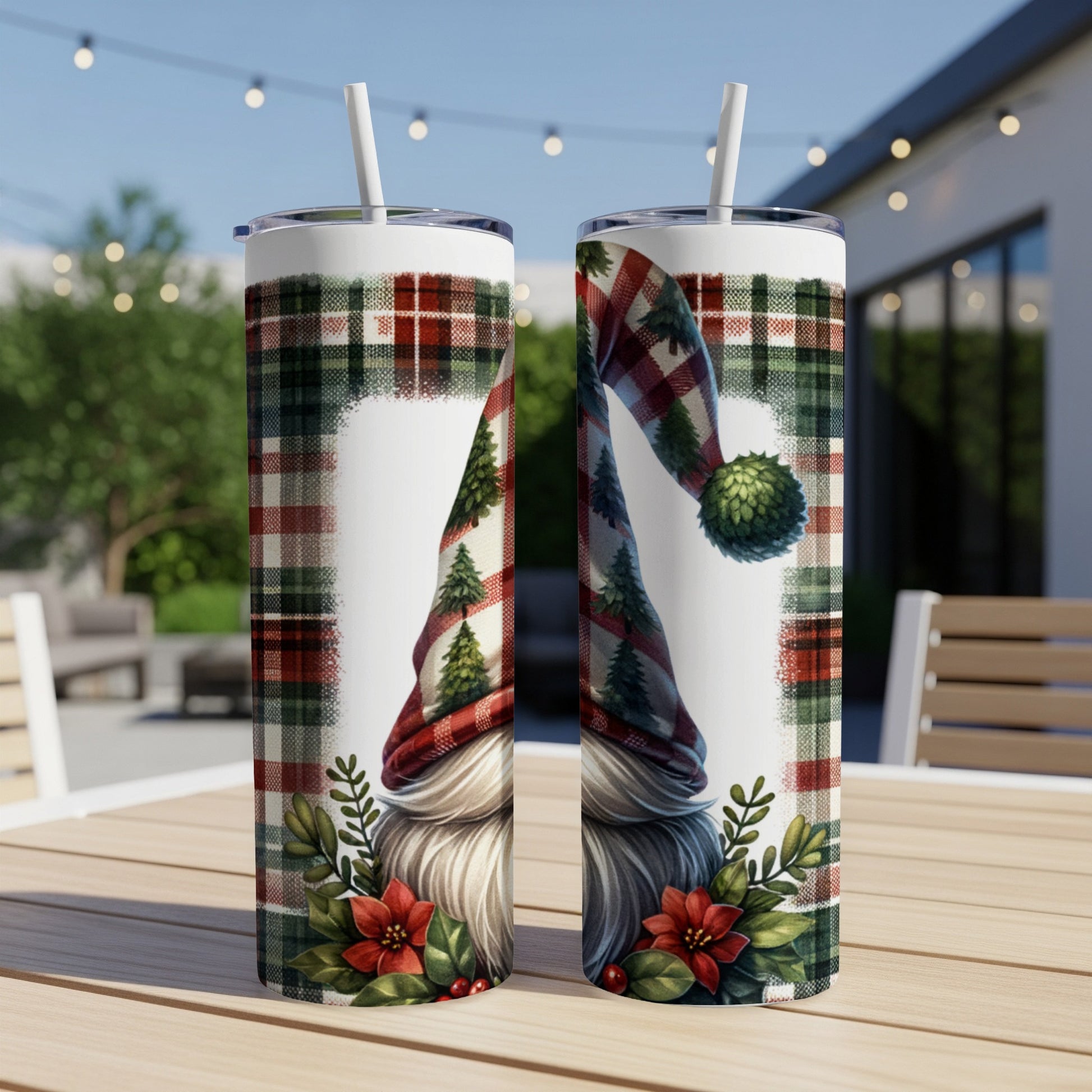 Christmas gnome tumbler with plaid hat and festive greenery.