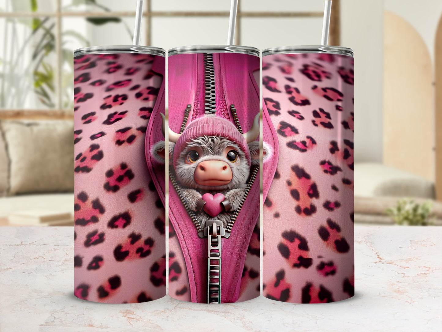 Pink leopard print tumbler with zipper revealing a cute bull character.