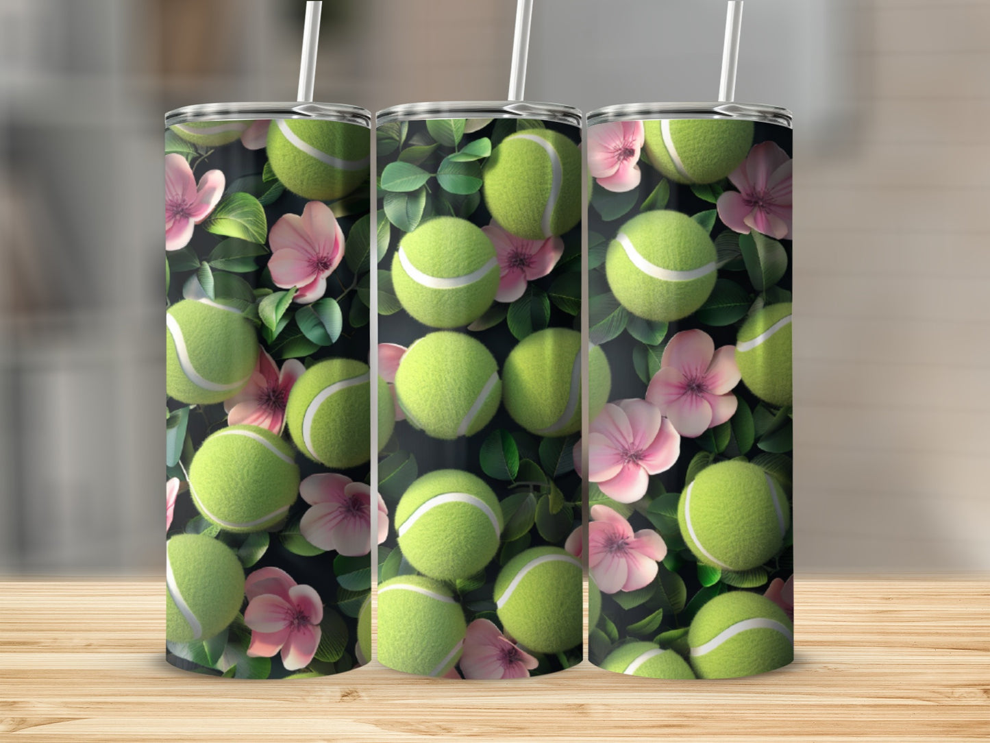 Three tumblers with a tennis ball and pink flower floral pattern.