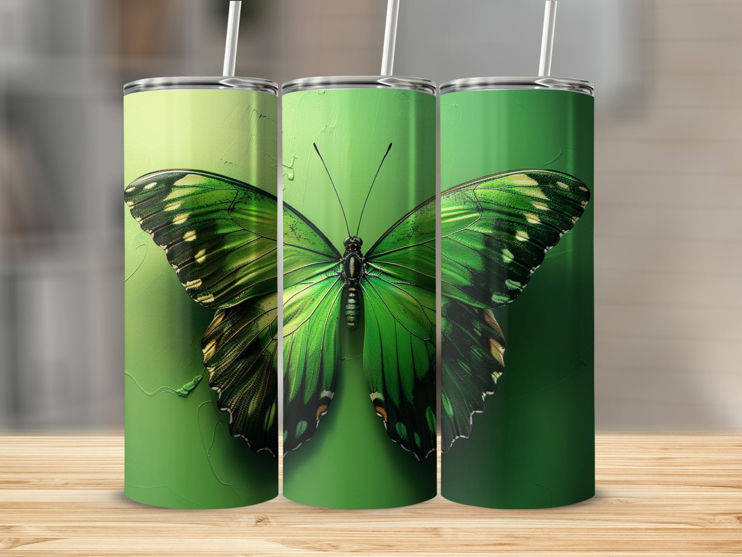 Three green tumblers showcasing a detailed iridescent green butterfly.