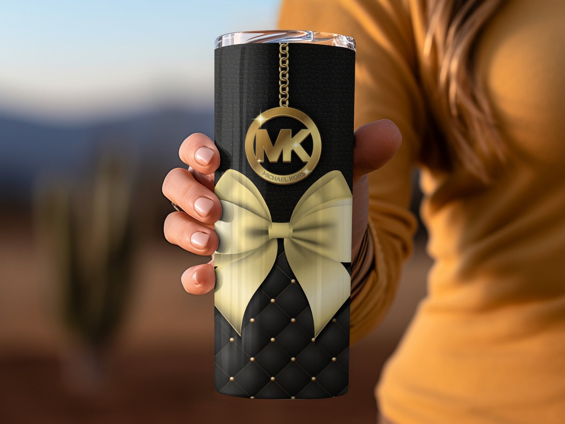 Black and Gold Tumbler with Bow and MK Logo Design