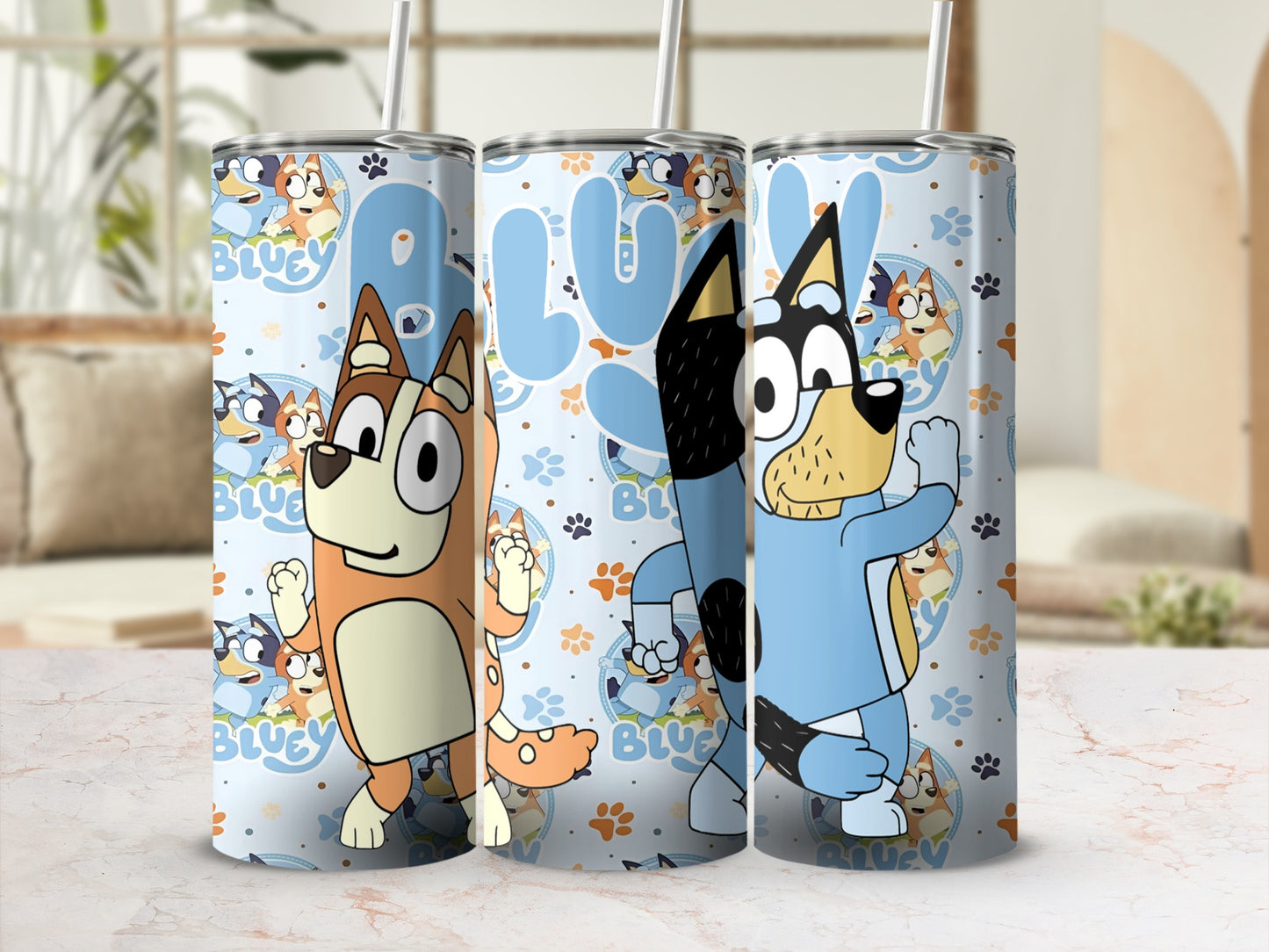 Bluey and Bingo characters on a light blue tumbler with "BLUEY" text.